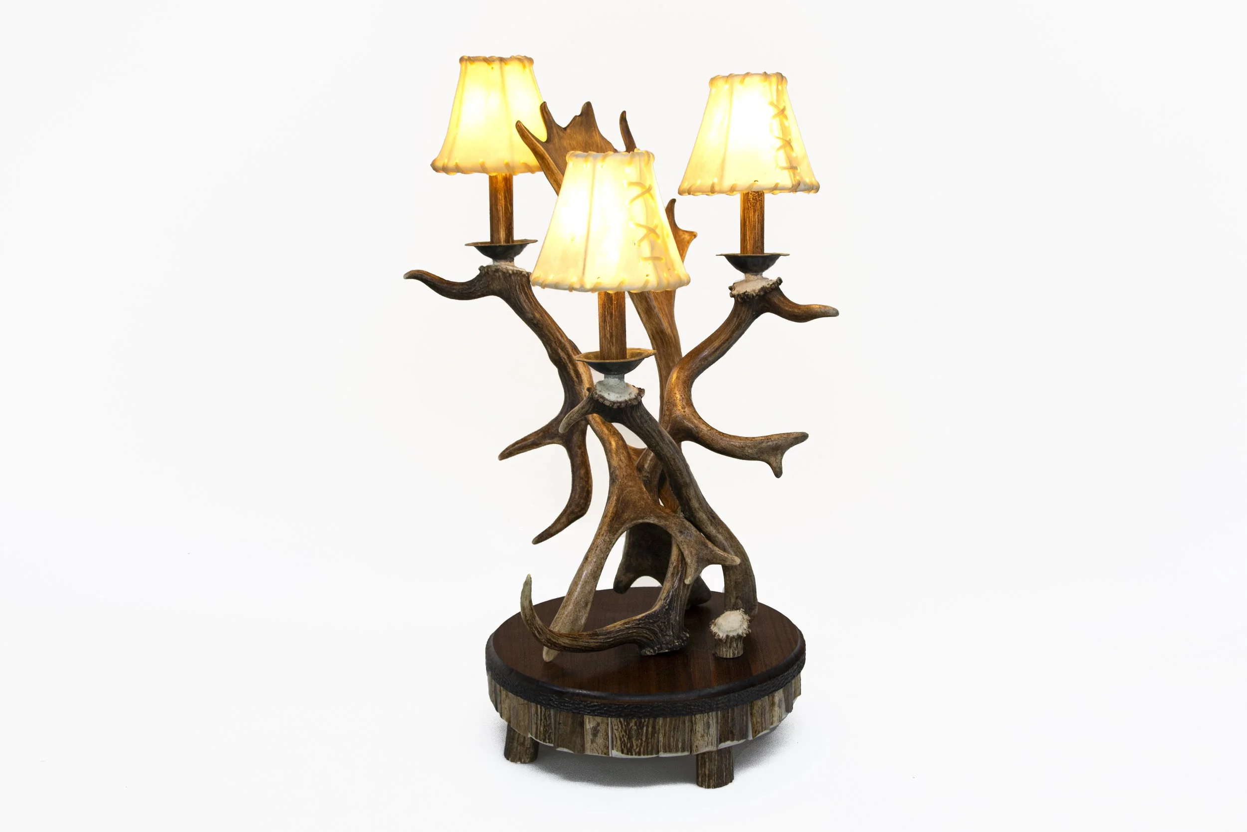 "Stagwood Table Lamp" by Doug Nordberg. Elk, Fallow & Whitetail Deer Antlers, Walnut, Dimensions: 24”h x 16”w x 16"d, $4,500.