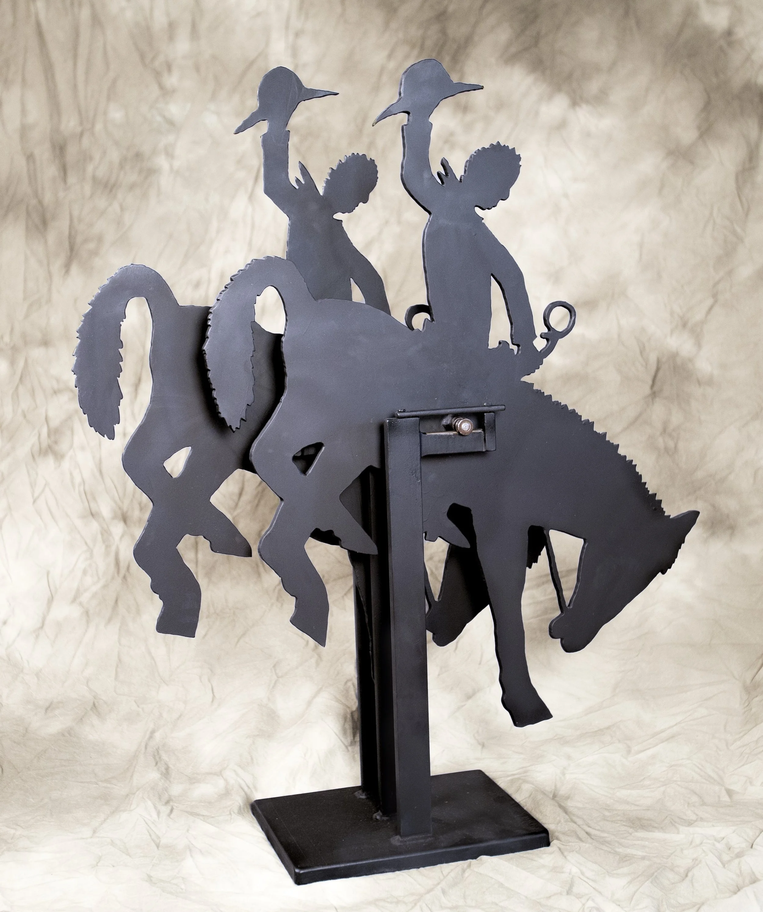 "The Buck Starts Here" by Charles Ringer. Kinetic Steel, 36 x 9 x 12 inches, $3,500. Lot 1.