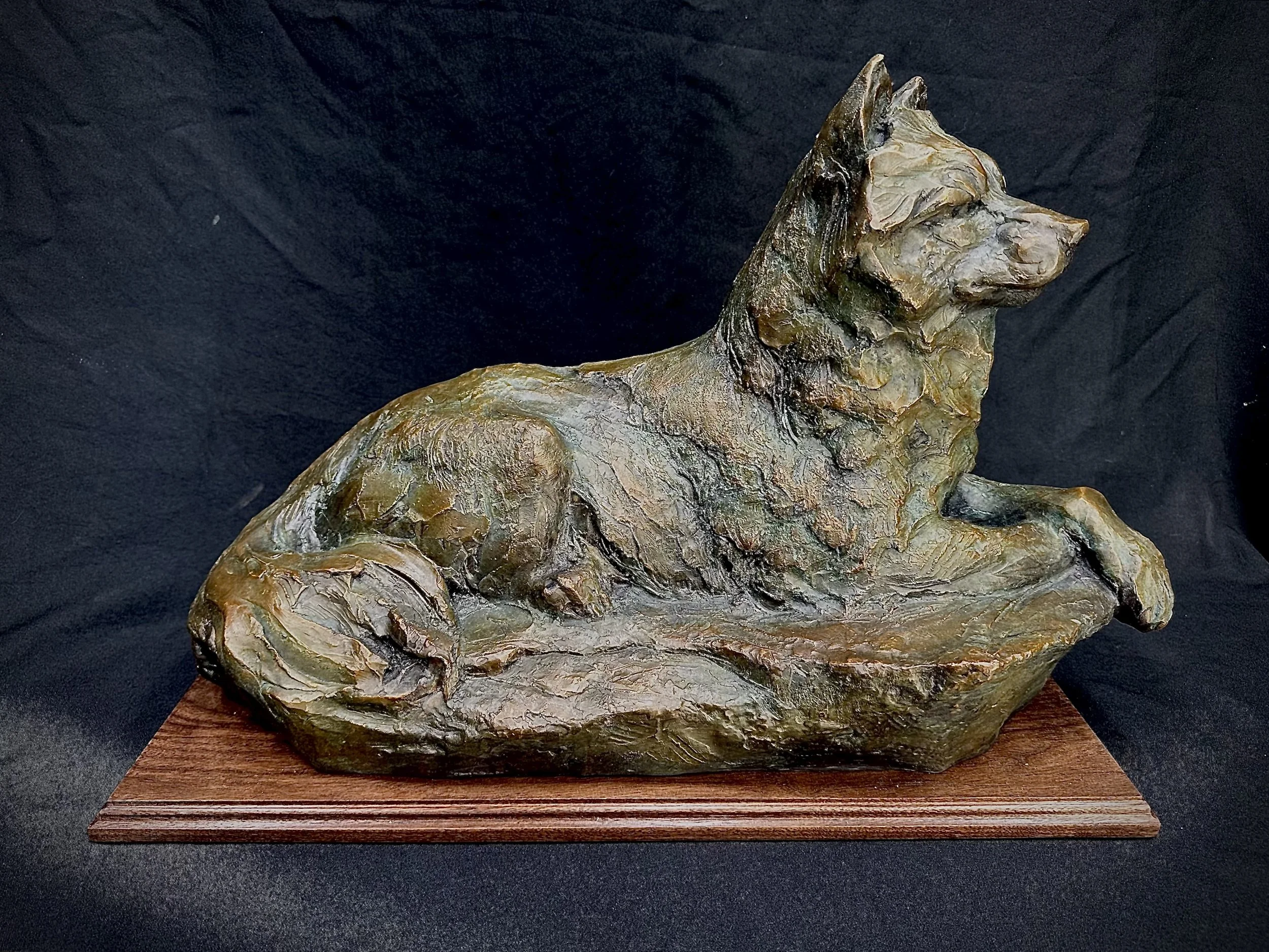 "Wolf Rock" by Sandy Scott. Bronze, 18 x 24 inches, $9,600. Lot 9.
