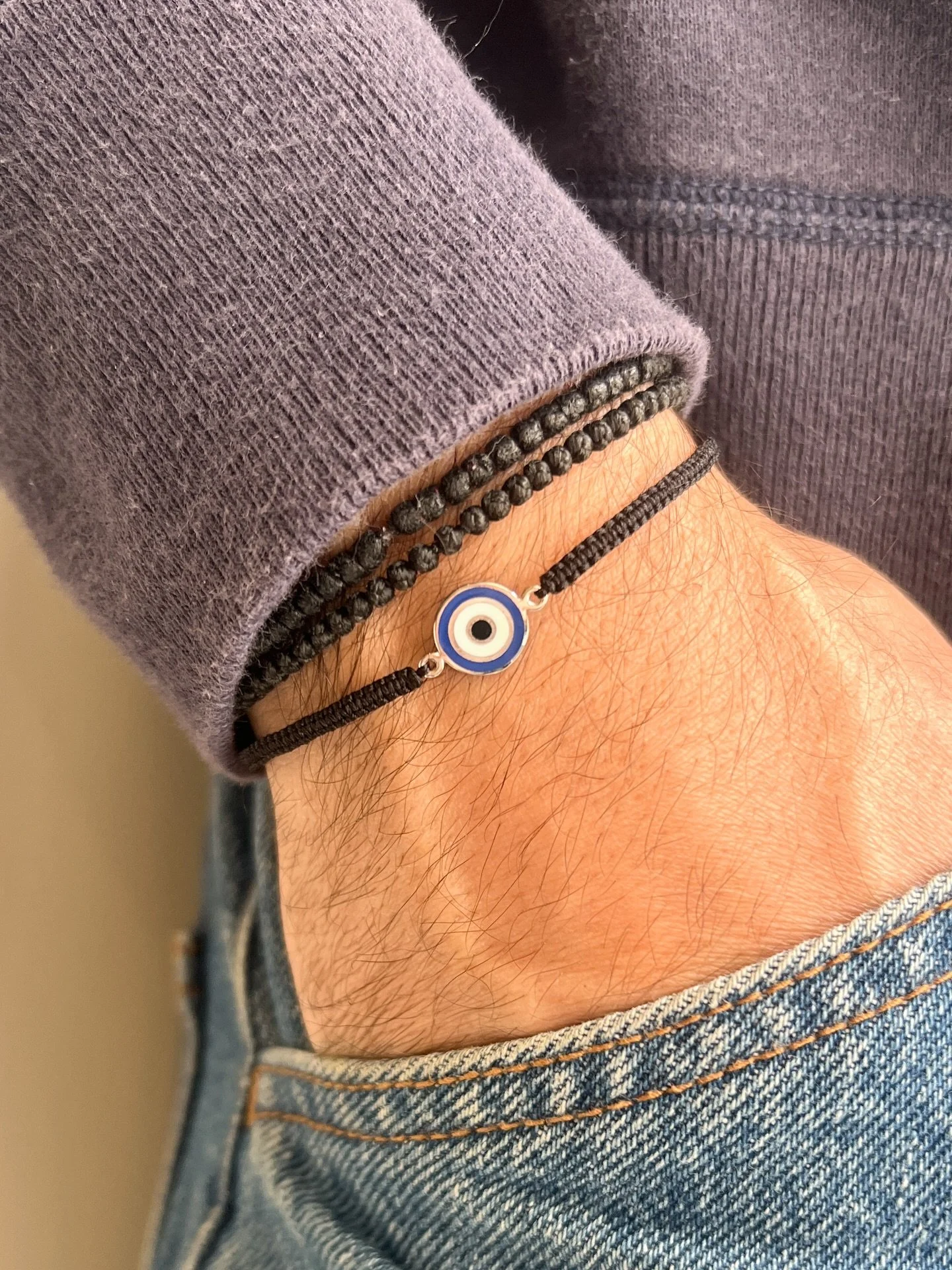 The @anthi.jewelry Cyclops Bracelet is now available with a macrame cord. Made in Greece from 14k gold and hand-applied enamel, it&rsquo;s perfect for him 🧿 Shop now on HellenicAesthetic.com