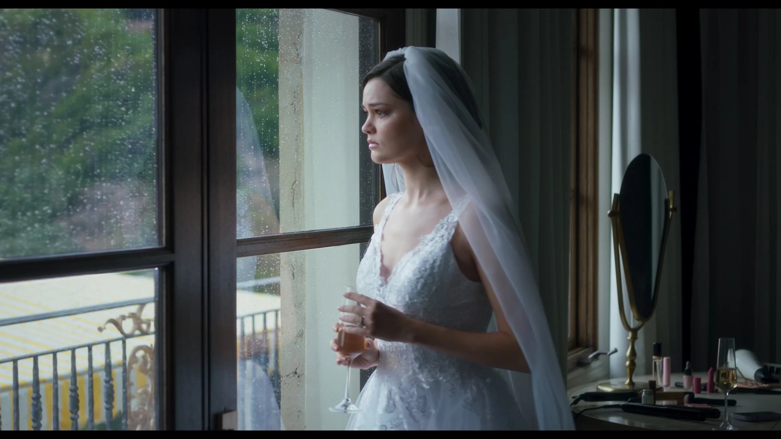 Eva looking out window in dress 4k.jpg