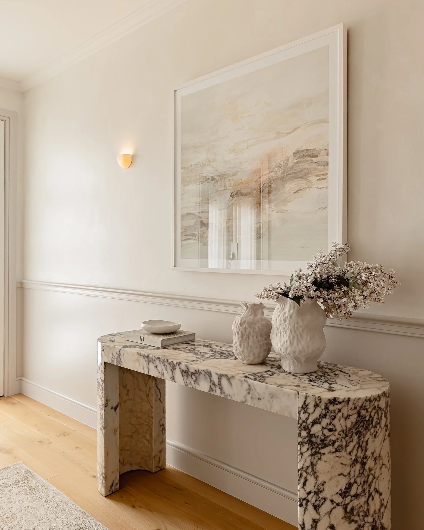 When your client has the most gorgeous marble console table, it calls for neutral styling to allow the colours of the marble to be the real hero 🤎 

&bull;

&bull;

&bull;

#sydneyrealestate #styledtosell #realestate #interiorinspo #interior #stylin