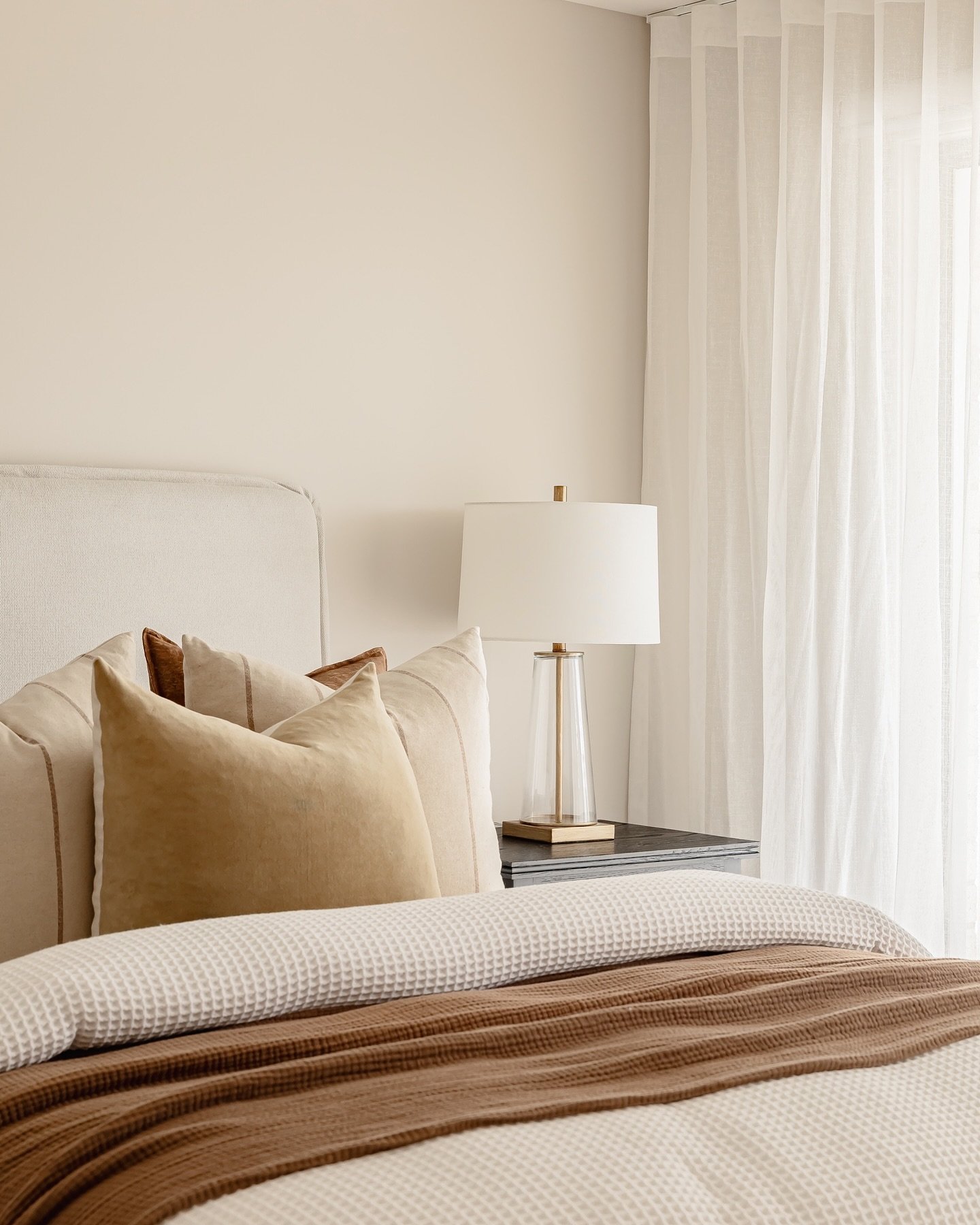 Soft layers, warm tones, and effortless calm&mdash;this bedroom was styled to feel like a retreat that you never want to leave 🤎