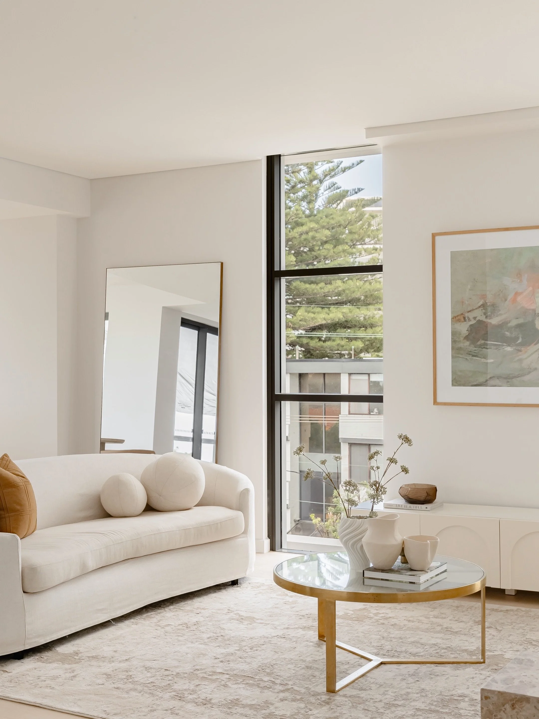 Beautiful design doesn&rsquo;t need to be loud to make an impact. Instead, at this beautiful brand new apartment we&rsquo;ve created a calm and welcoming space. The kind of space that quietly invites you in. Morning coffee while the sunlight filters 