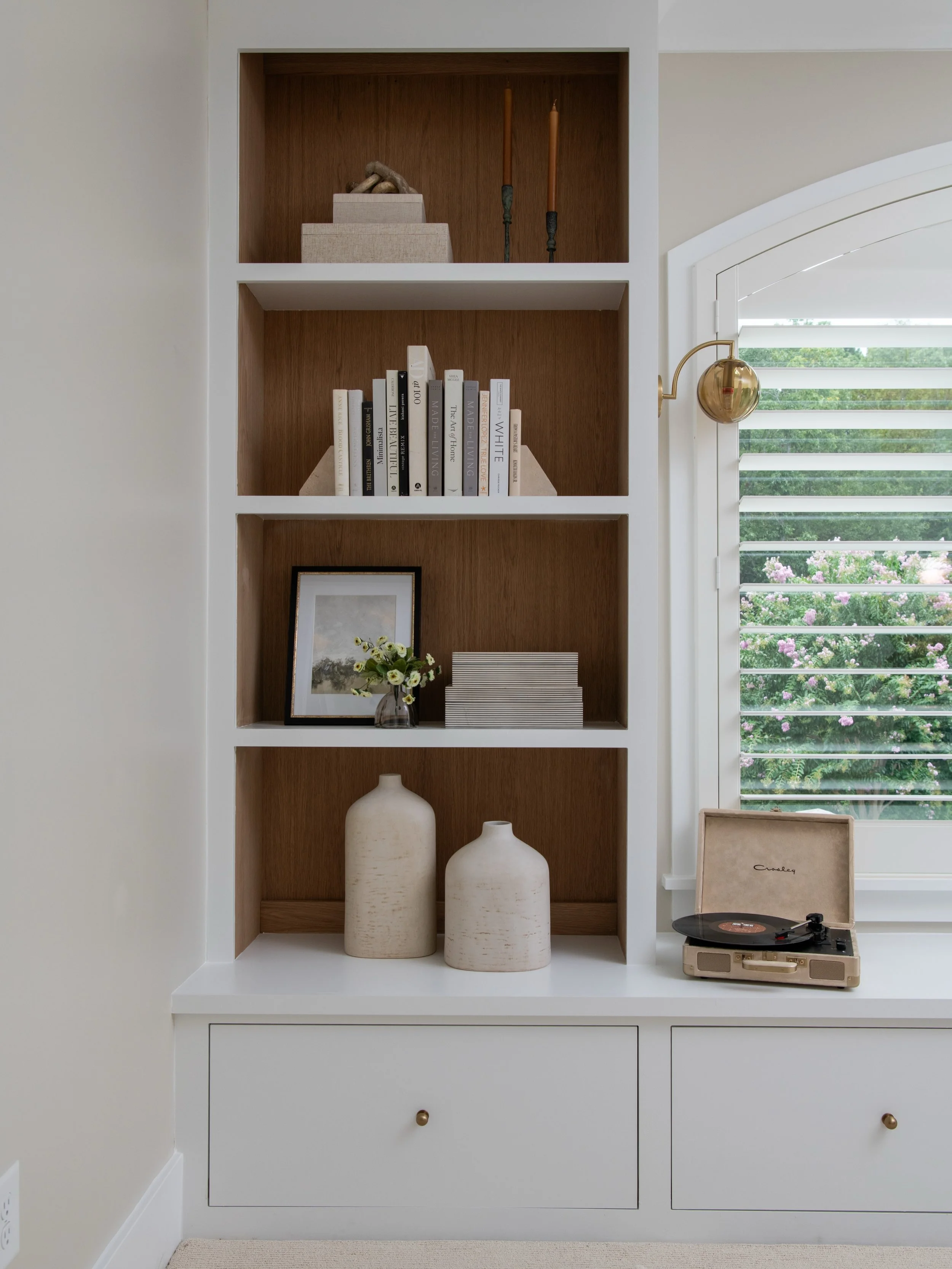 The power of built-ins. 🤍

Instead of filling this room and the adjacent pass through with individual furniture pieces, we used custom built-ins to completely rethink how the space could function.

What was once an unused bedroom and basic storage a