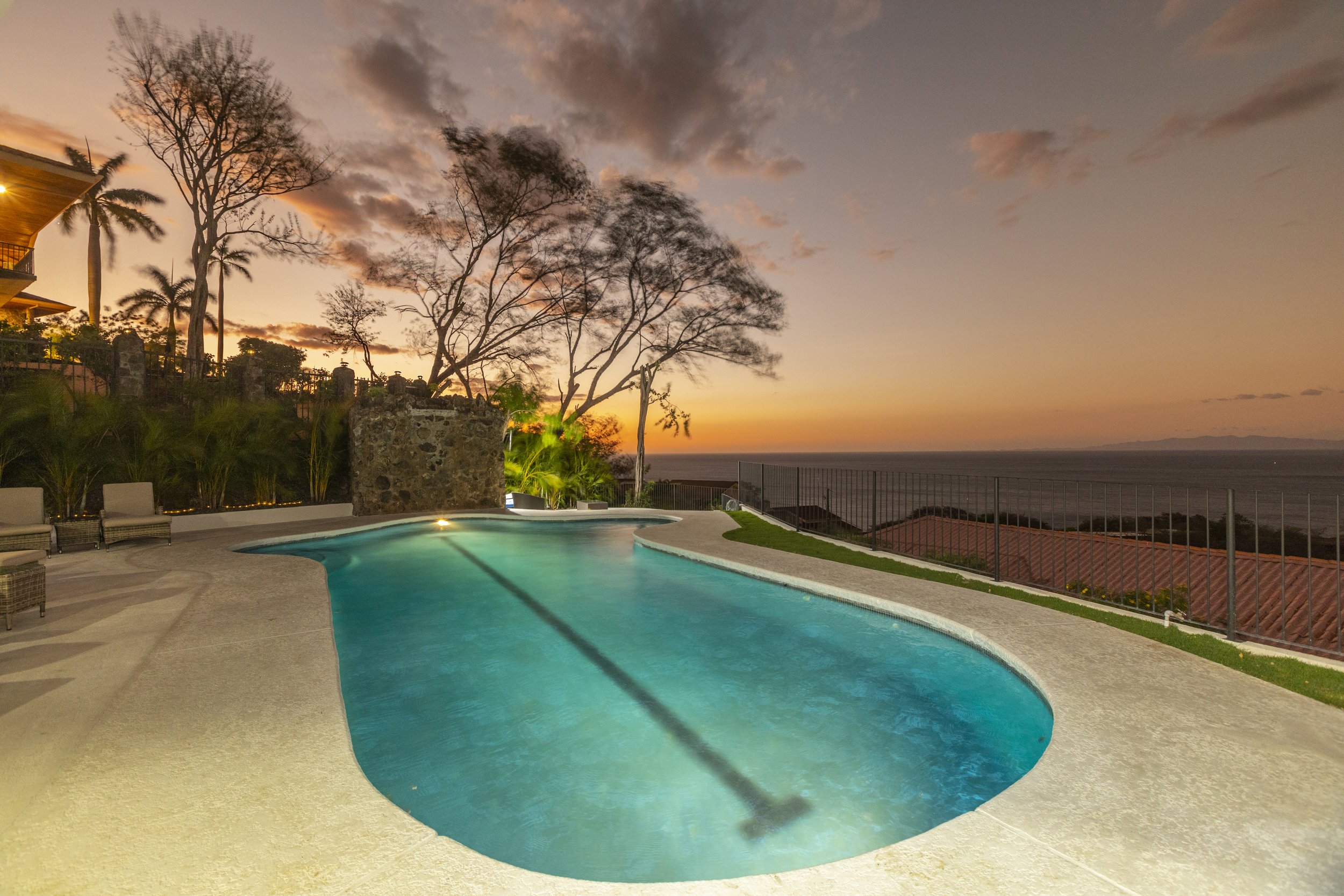 PE Exterior Pool Sunset with Bay.jpg