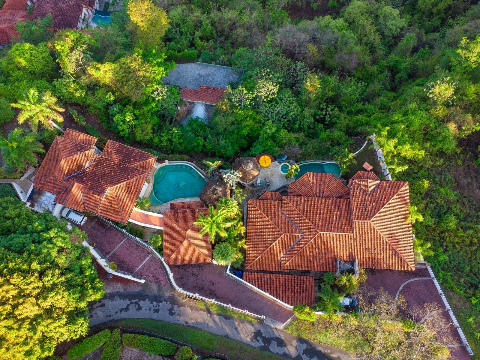 Durazno Aerial villa on right with yellow umbrella.jpeg