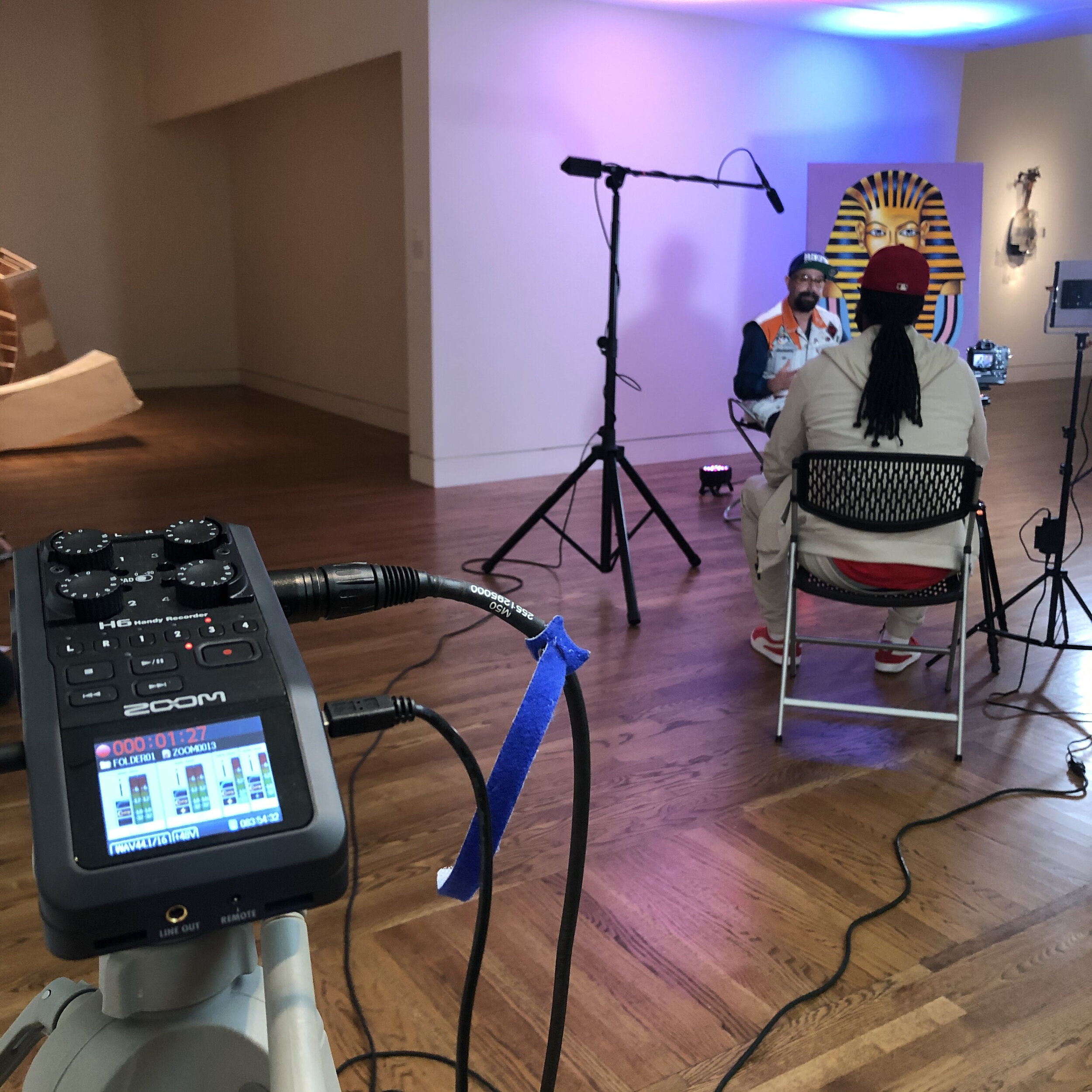 Kan Jones interviewing local graffiti artist Mayfair