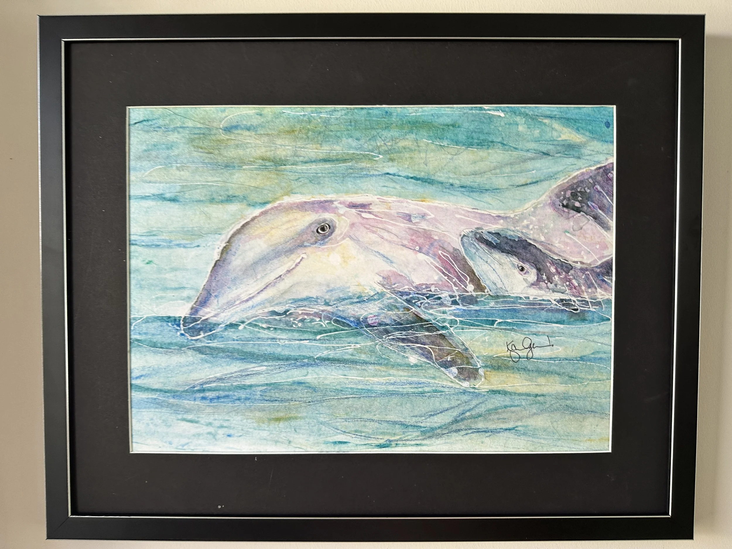 KGerard_dolphin Cuddles with frame.jpeg