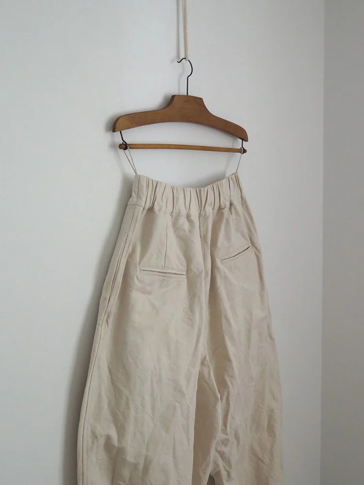 UNDYED CANVAS PLEATED TROUSERS.jpg