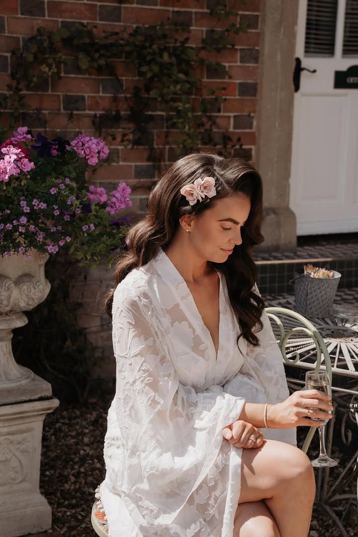 Delicate pale pink cherry blossom hairpiece for weddings and special occasions. A petite, romantic floral accessory perfect for brides and bridesmaids.