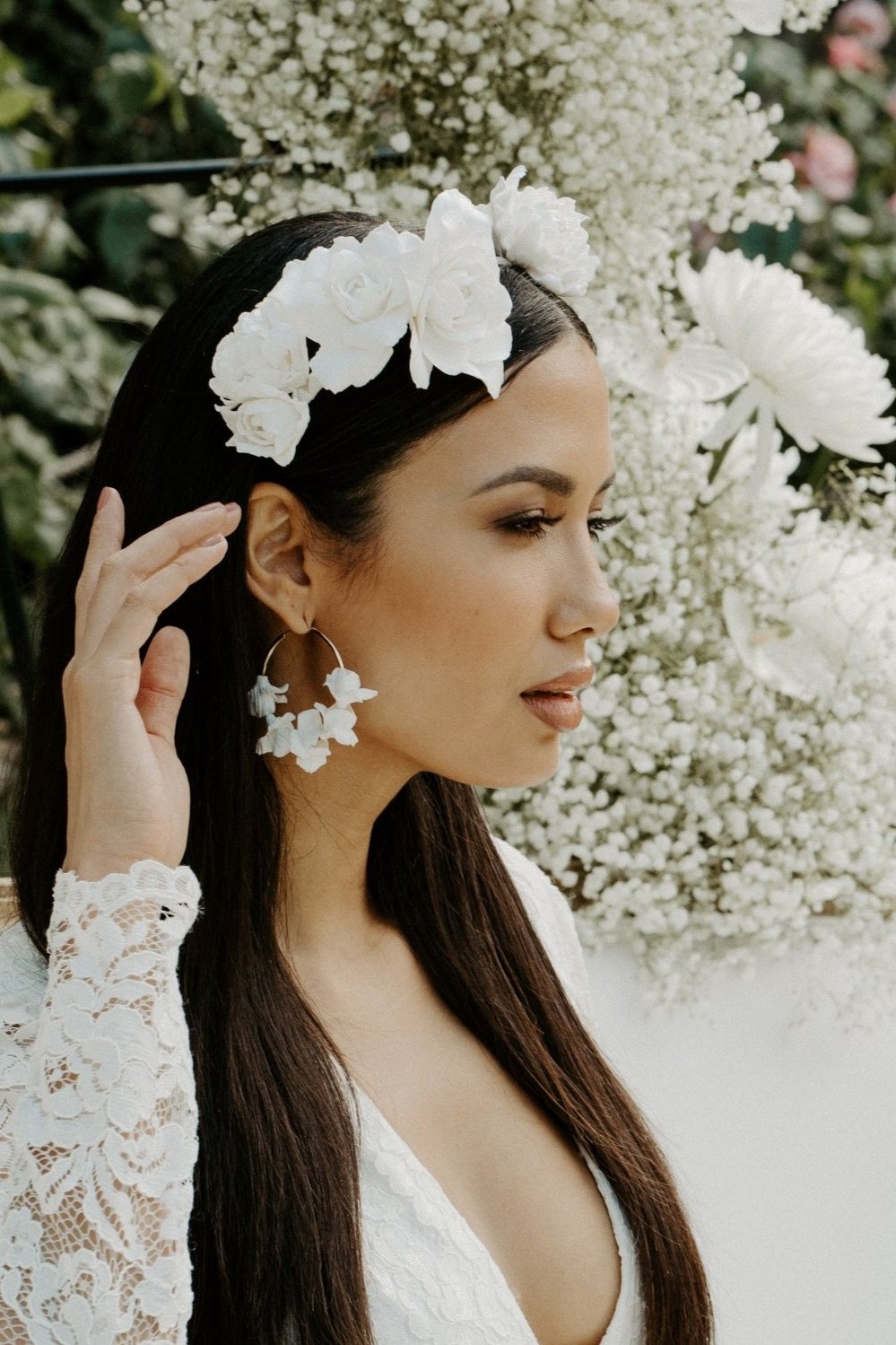 bride wearing floral hoop earrings lightweight bridal jewellery wedding day earrings