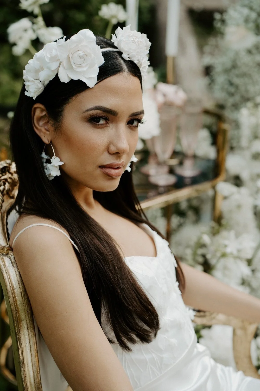 bride wearing floral hoop earrings lightweight bridal jewellery wedding day earrings