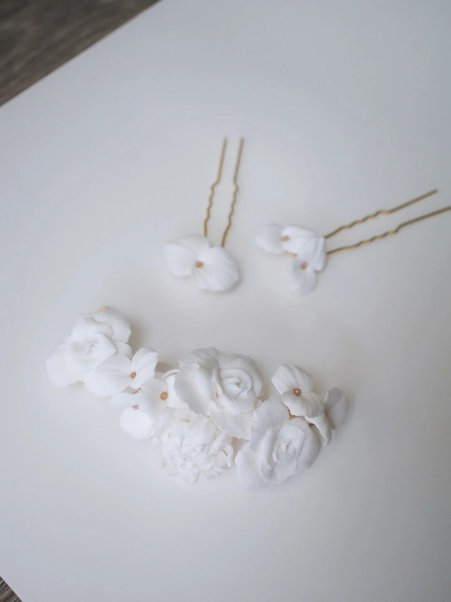 So what&rsquo;s the secret to a pulled-together bridal look? Sometimes it&rsquo;s just the right hair piece. This handmade vine with roses, chrysanthemums, and jasmine can make it feel complete - lightweight, flexible, worn with or without a veil and
