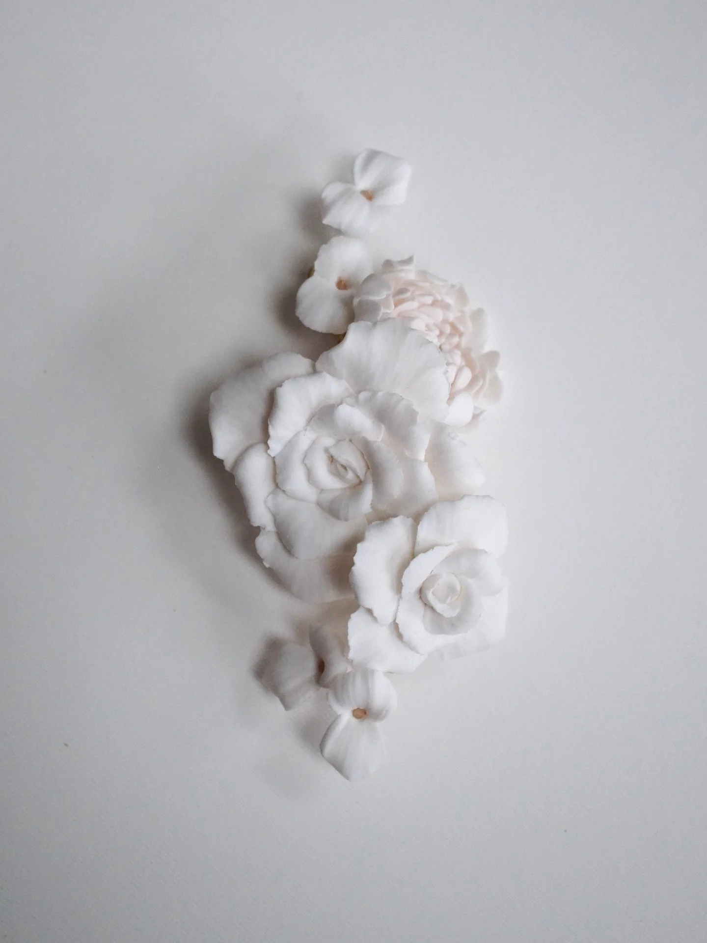 For the minimalist bride who still wants impact my Rose, Chrysanthemum and Jasmine hair comb ticks all the boxes.