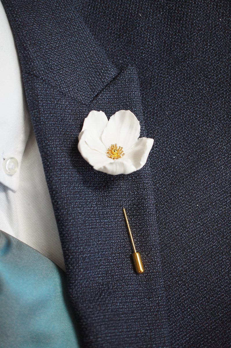 cosmos buttonhole on suit.jpg