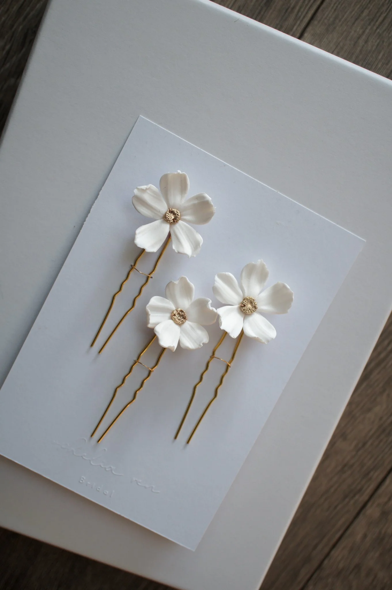 White Daisy style clay hairpin set with gold centre for brides and bridesmaids