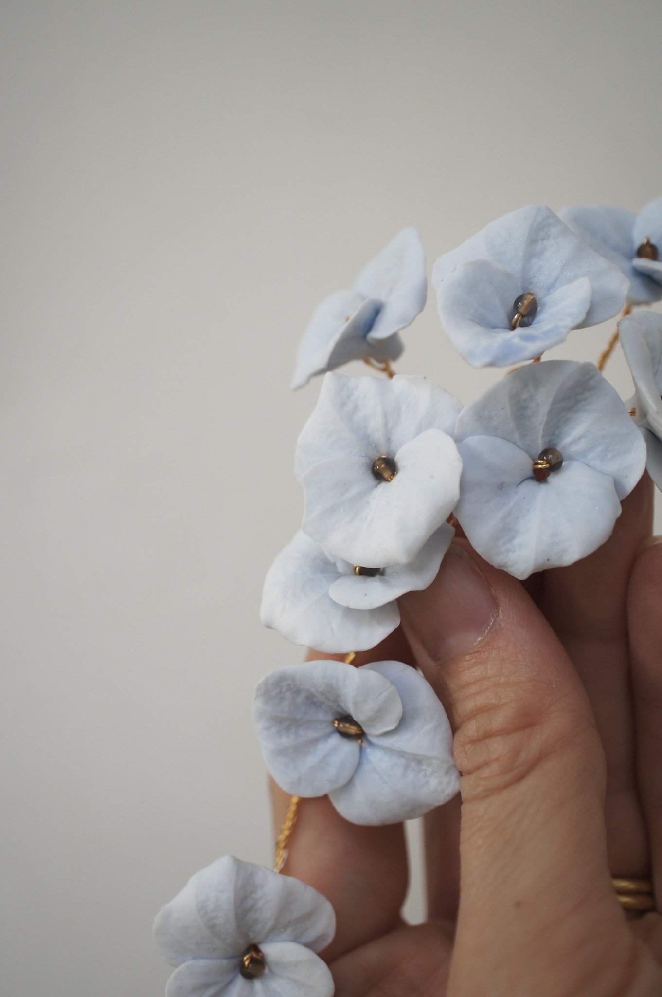 Romantic pale blue hydrangea hair vine set with matching pins. A delicate floral hair accessory perfect for weddings, bridesmaids, and special occasions.