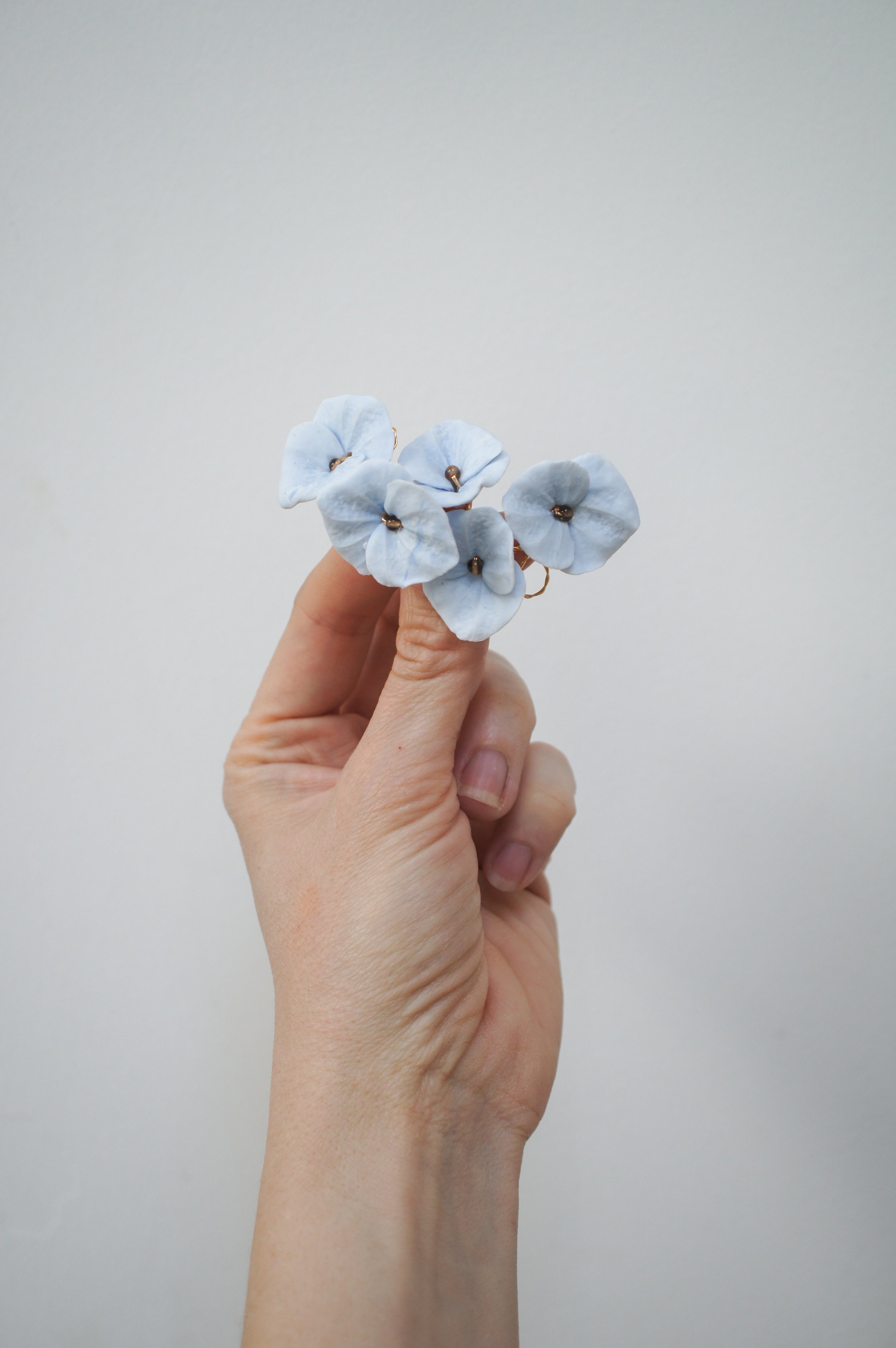 Romantic pale blue hydrangea hair vine set with matching pins. A delicate floral hair accessory perfect for weddings, bridesmaids, and special occasions.