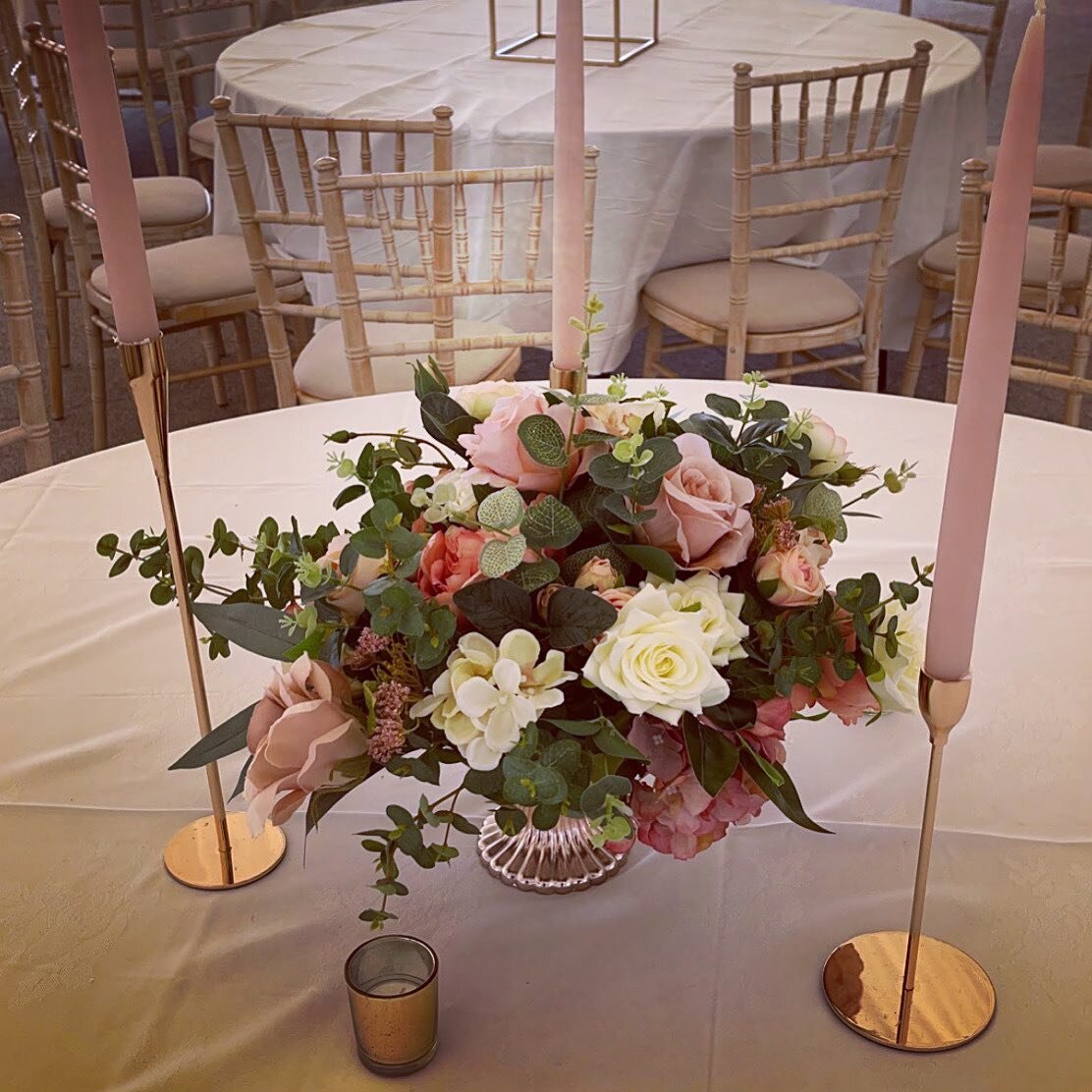 BLUSHING BEAUTY 

Low level pieces elegantly balanced with candles - each piece is curated with love to compliment your ceremony &hellip;floral designs to give texture and feel of natures creation with nearly real flowers

#venuestyling #weddingflowe