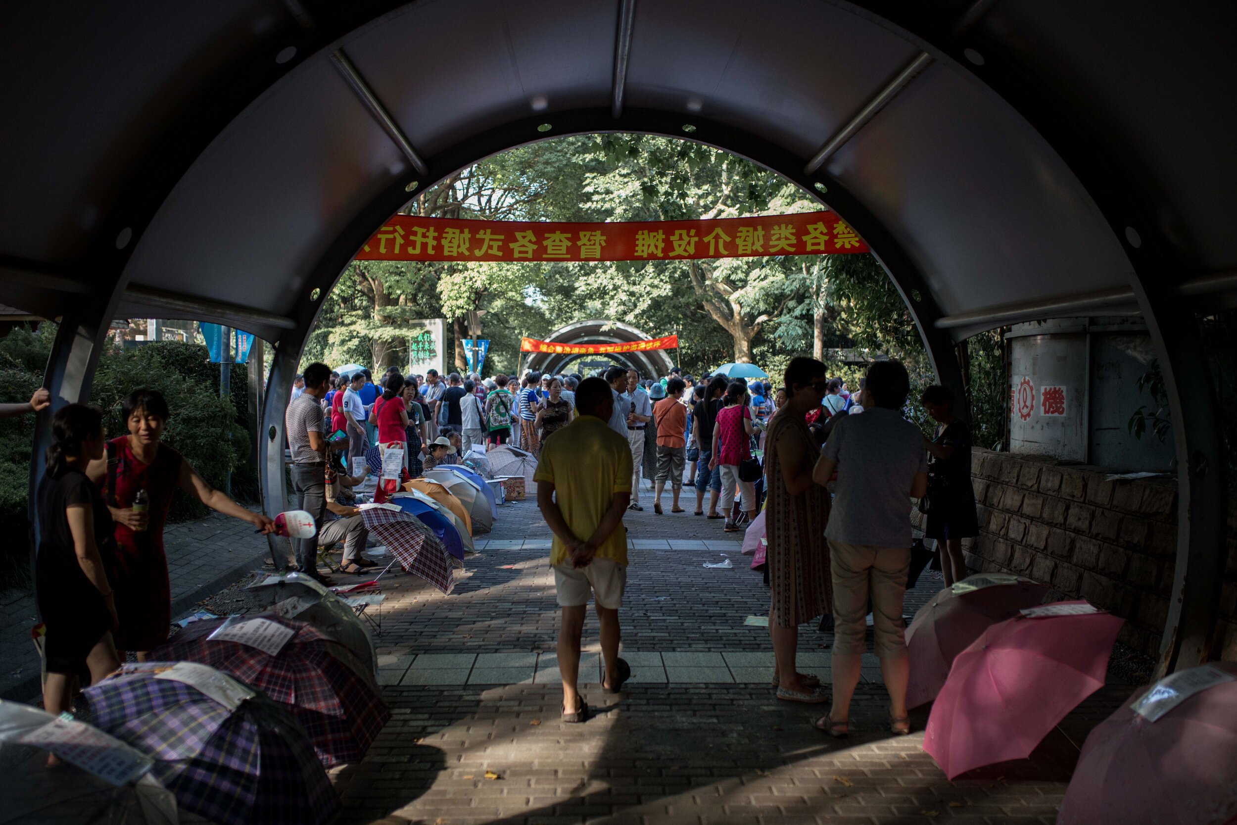  On weekends in People’s Park in Shanghai, hundreds of eager parents meet at the “Marriage Market” as it know among locals, holding paper ads or pasting them to umbrellas, trading contact information, hoping to find a match for their children. 