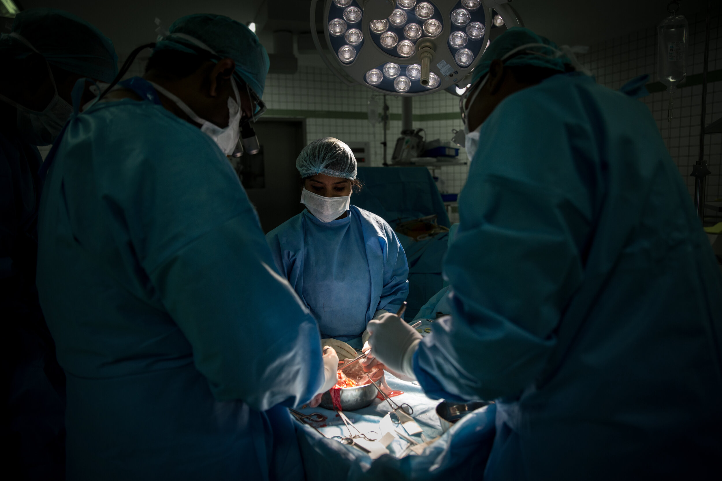  Surgeons prepare a kidney for transplant at a private hospital in Chennai, India. 
