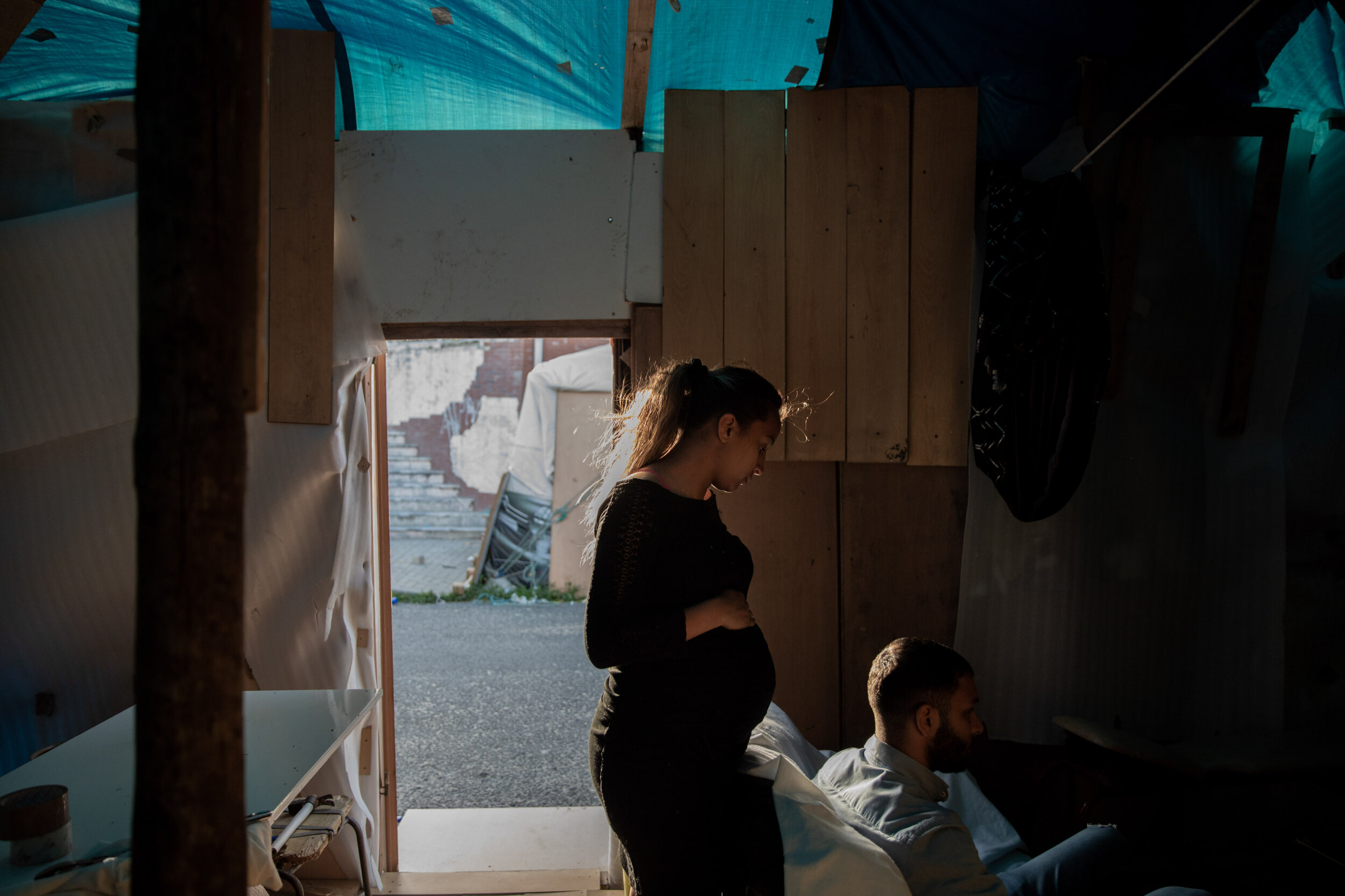  5th of May 2020   Naíde, 16, and Wilson, 23, were evicted in 2019 from the apartment they were squatting in Lisbon and have since been living in this improvised shelter in the Bensaúde Neighborhood in Lisbon. 