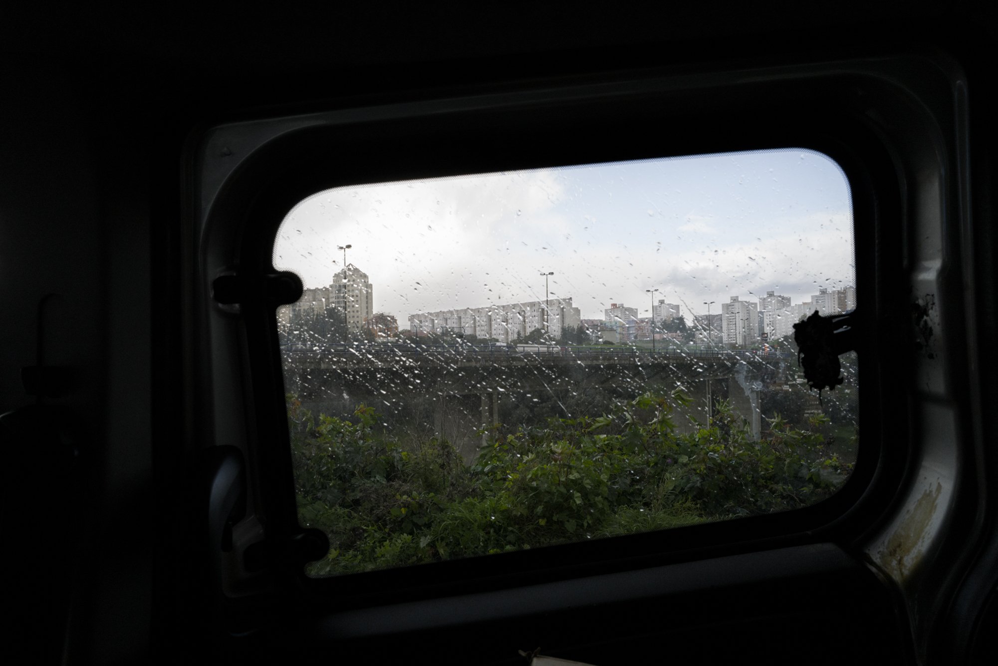  A view of Olaias, Lisbon, from Crescer’s car. For the past 20 years, two outreach teams made up of psychologists, social workers and nurses, have traveled to Lisbon’s many squalid and dark places where addicts use. 4/12/2020 