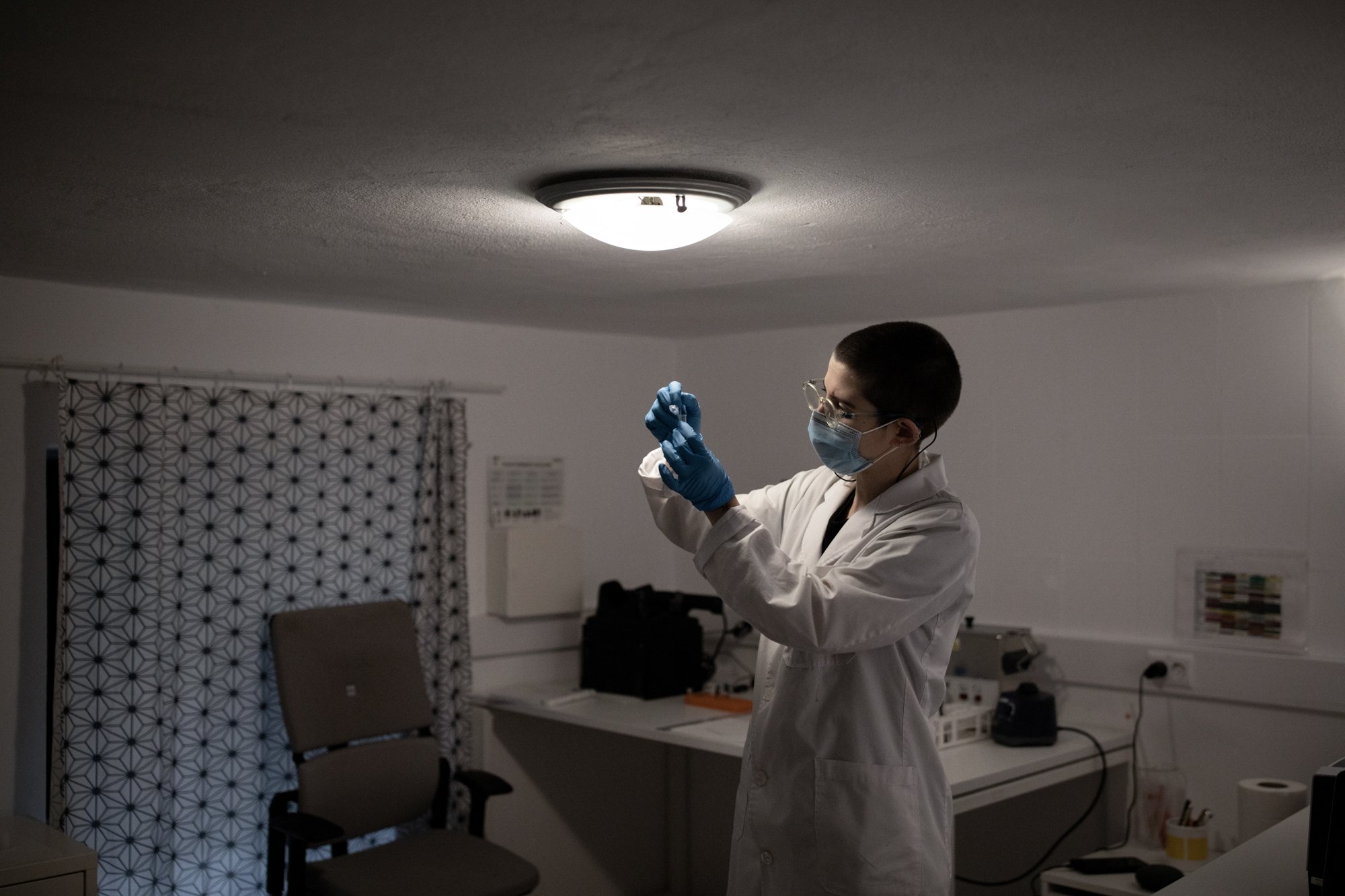  Mar (they/them), a chemist, checks a LSD sample at Kosmicare’s lab in Lisbon. Kosmicare is a government funded drug checking organization that allows users to test the substances they buy and develop a safer relationship to drugs. 1/04/2021 