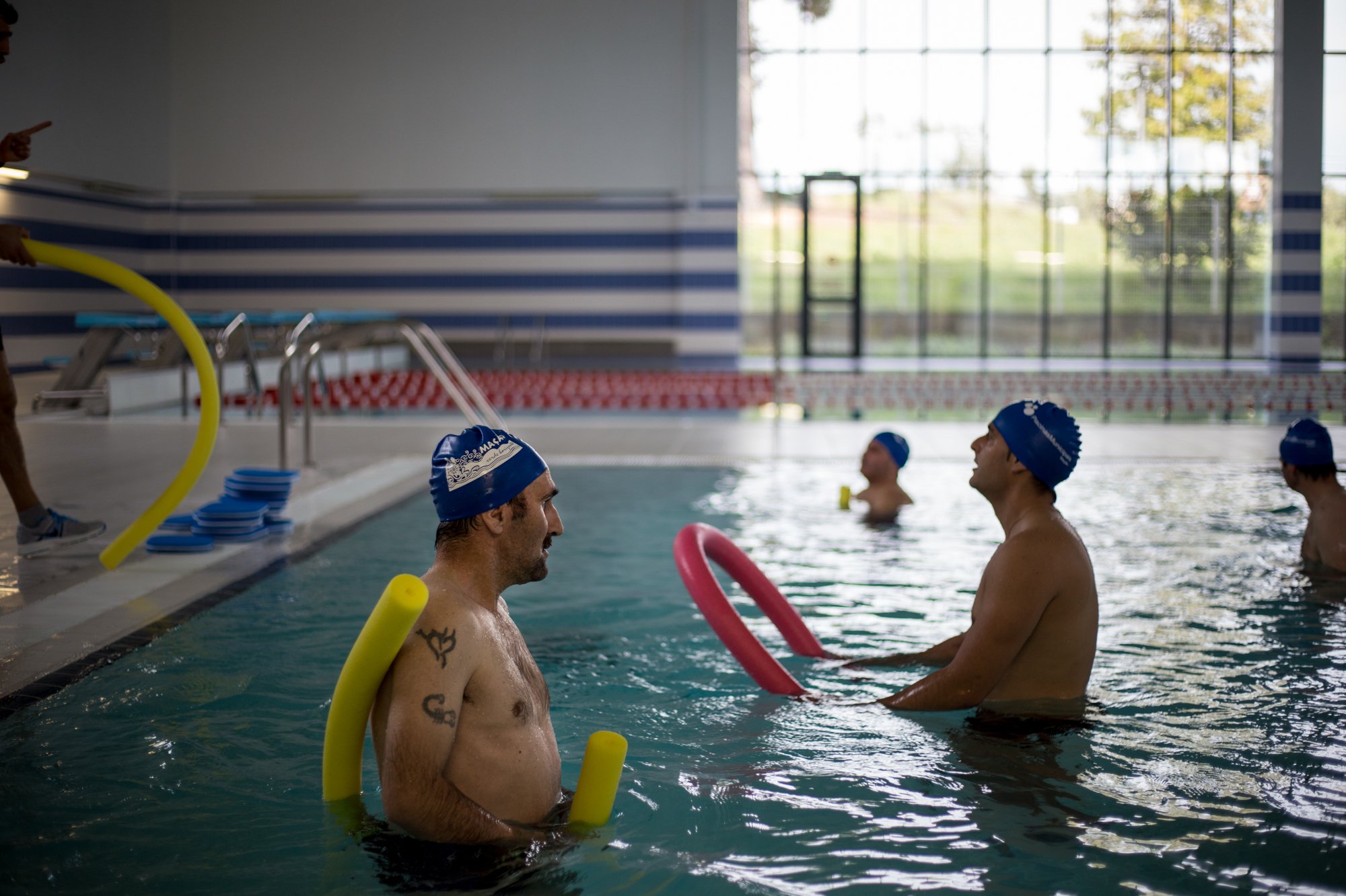  “When I got here two months ago I had to undress myself for the medical checkup. The doctor looked at me and said ‘You truly are a human skeleton. You got here just in time’." Carlos recalls, while patting his new formed belly in the locker room bef