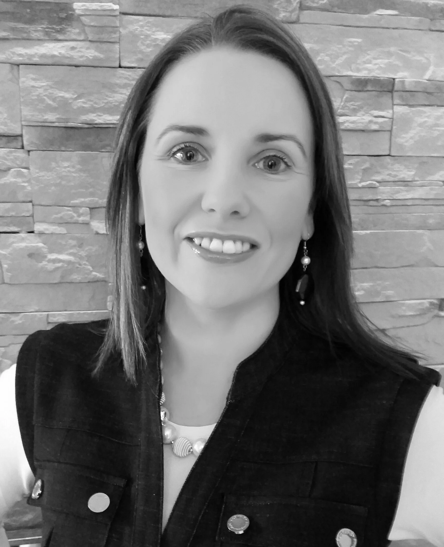 Black-and-white portrait of Helen Morgan, Design Director of Darren Morgan Design.