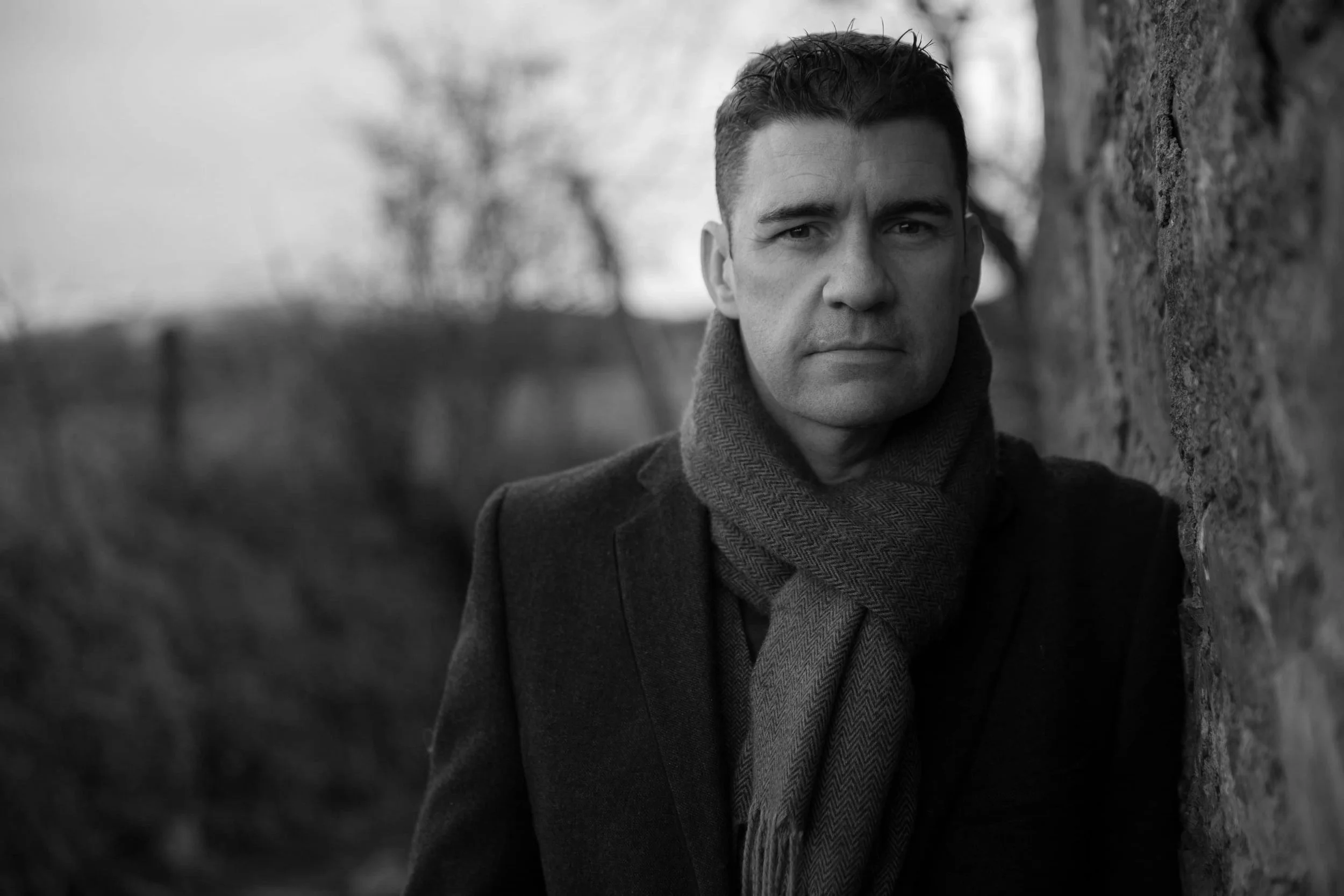 Black-and-white portrait of Darren Morgan, Creative Director of Darren Morgan Design.
