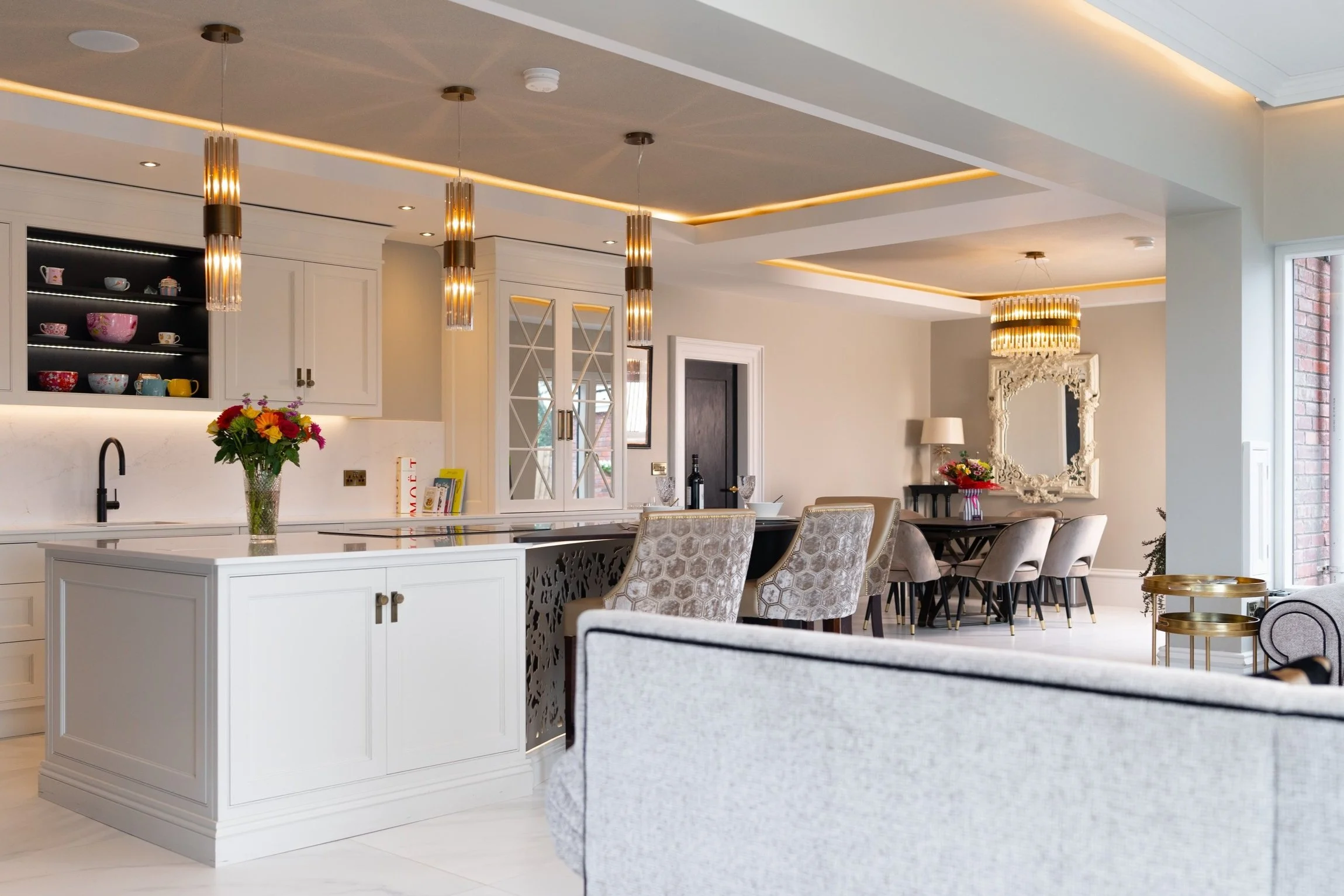 Completed luxury classical kitchen, dining and living space demonstrating considered whole-home design by Darren Morgan Design.