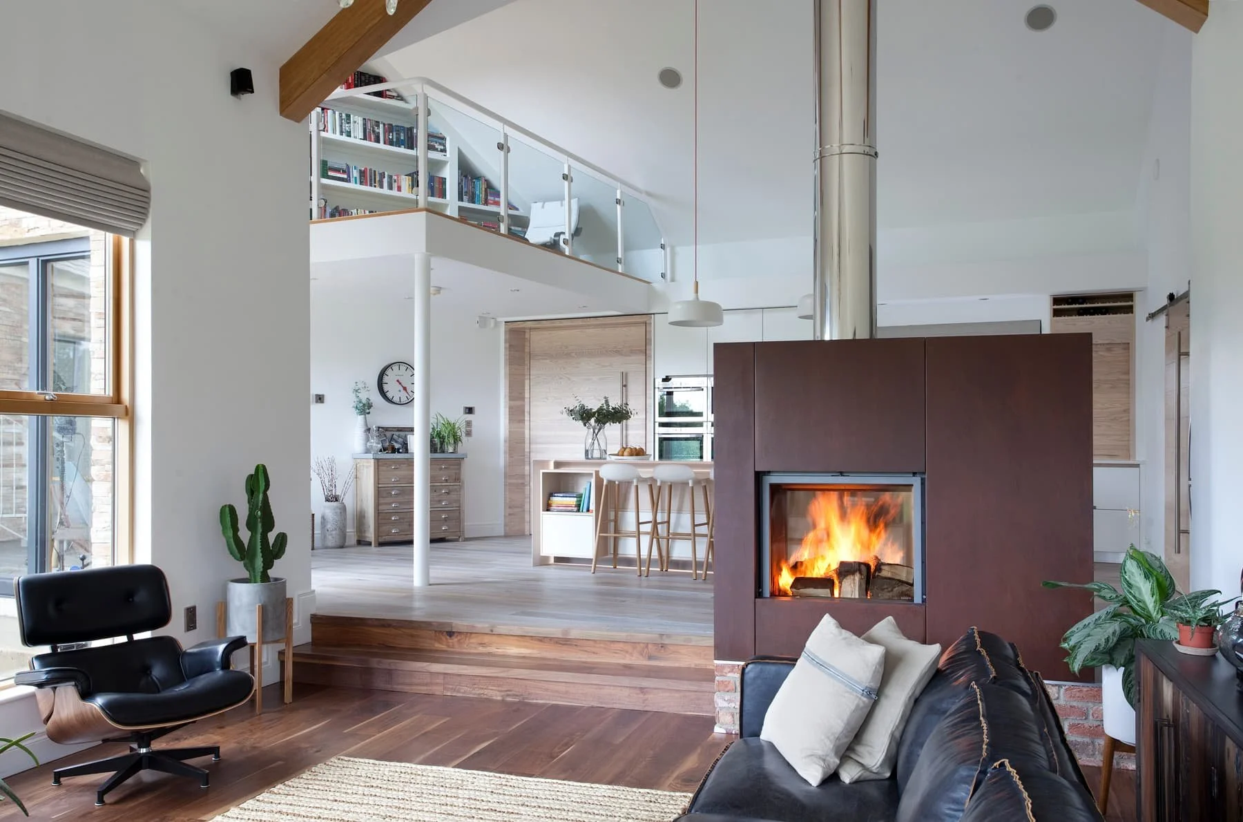 Completed contemporary Scandinavian-style kitchen featuring natural materials and bespoke cabinetry by Darren Morgan Design.