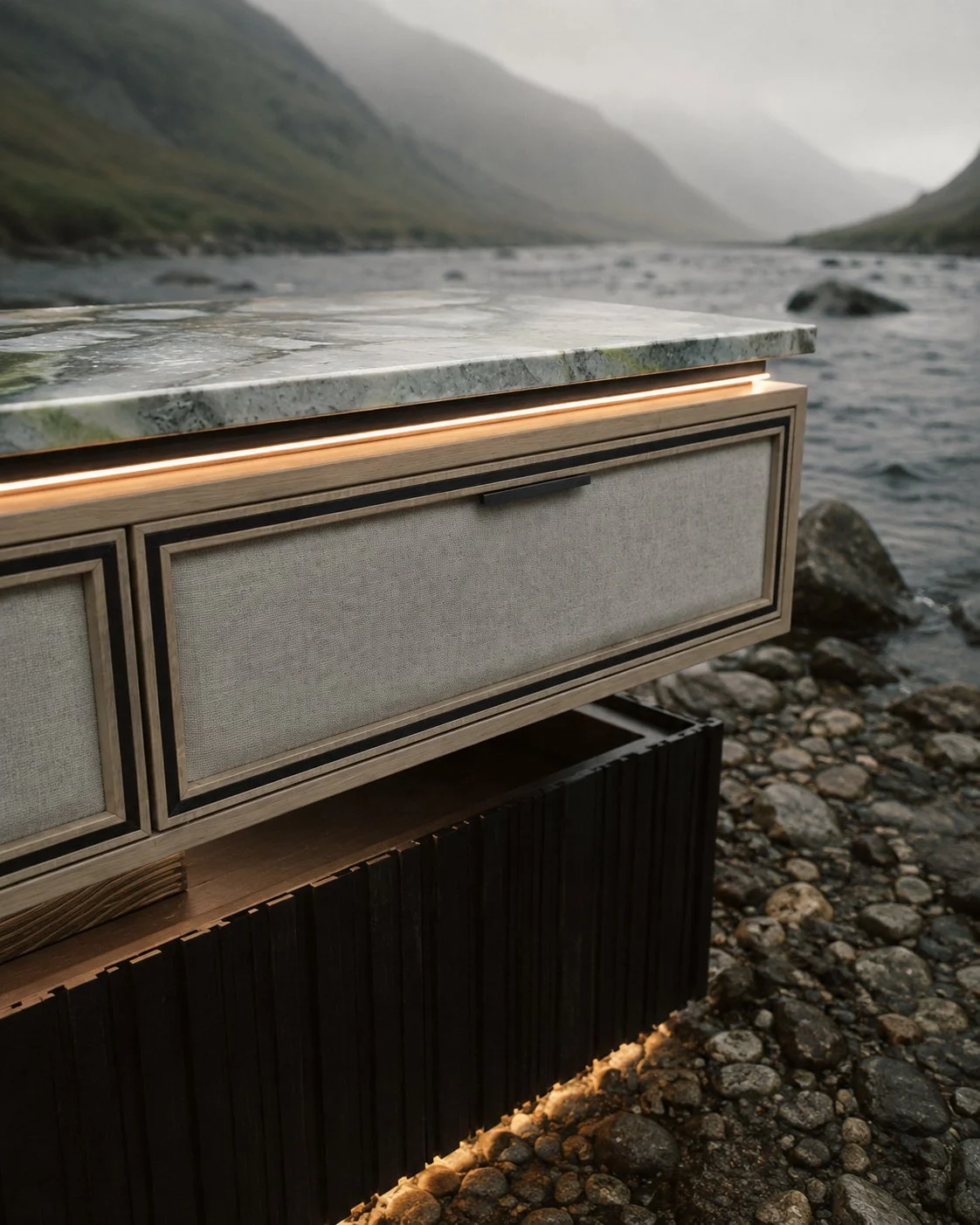Kildara Dún Briste console presented in a river landscape setting.