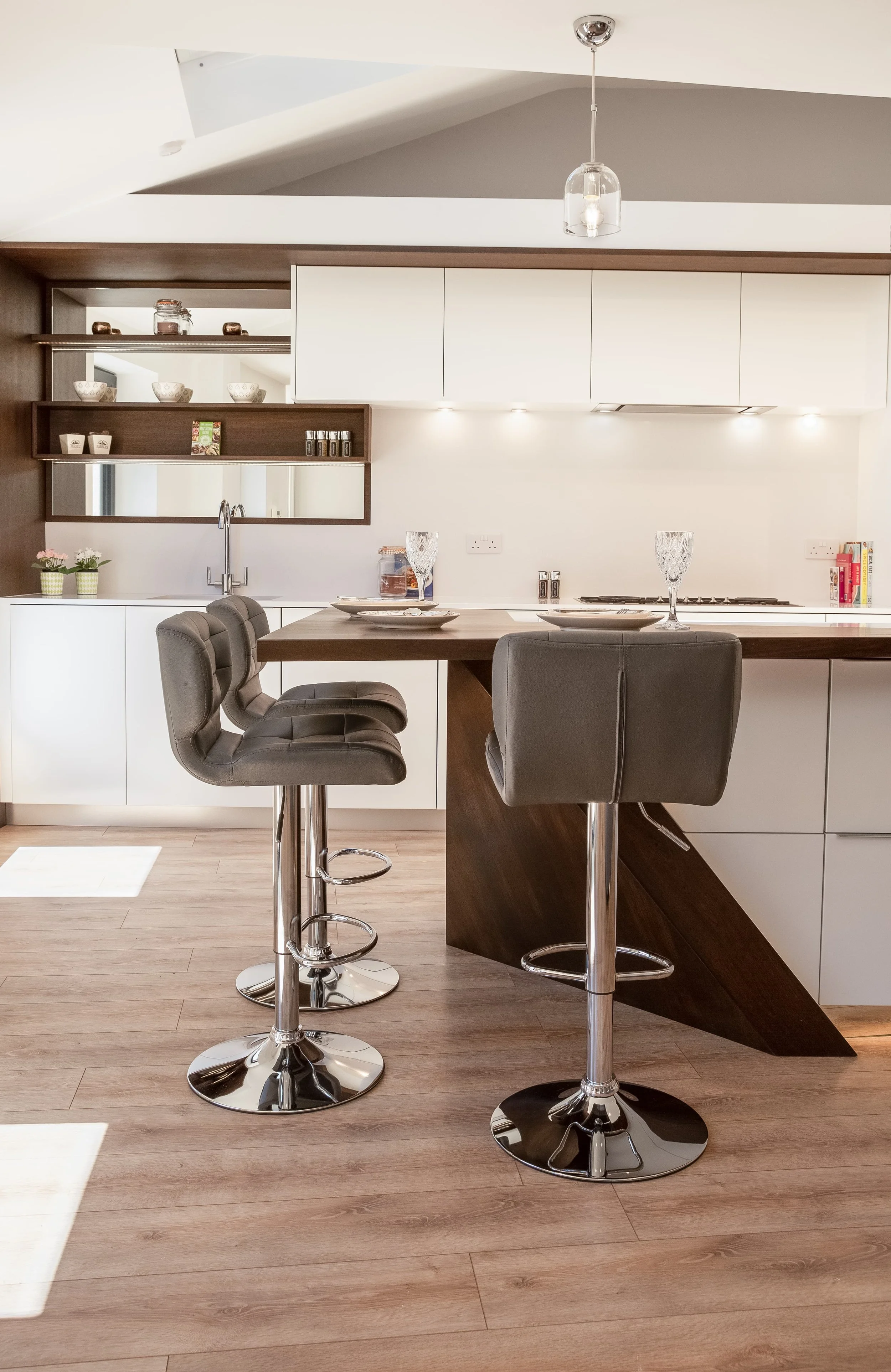 Contemporary luxury kitchen demonstrating award-winning kitchen design and bespoke furniture by Darren Morgan Design.