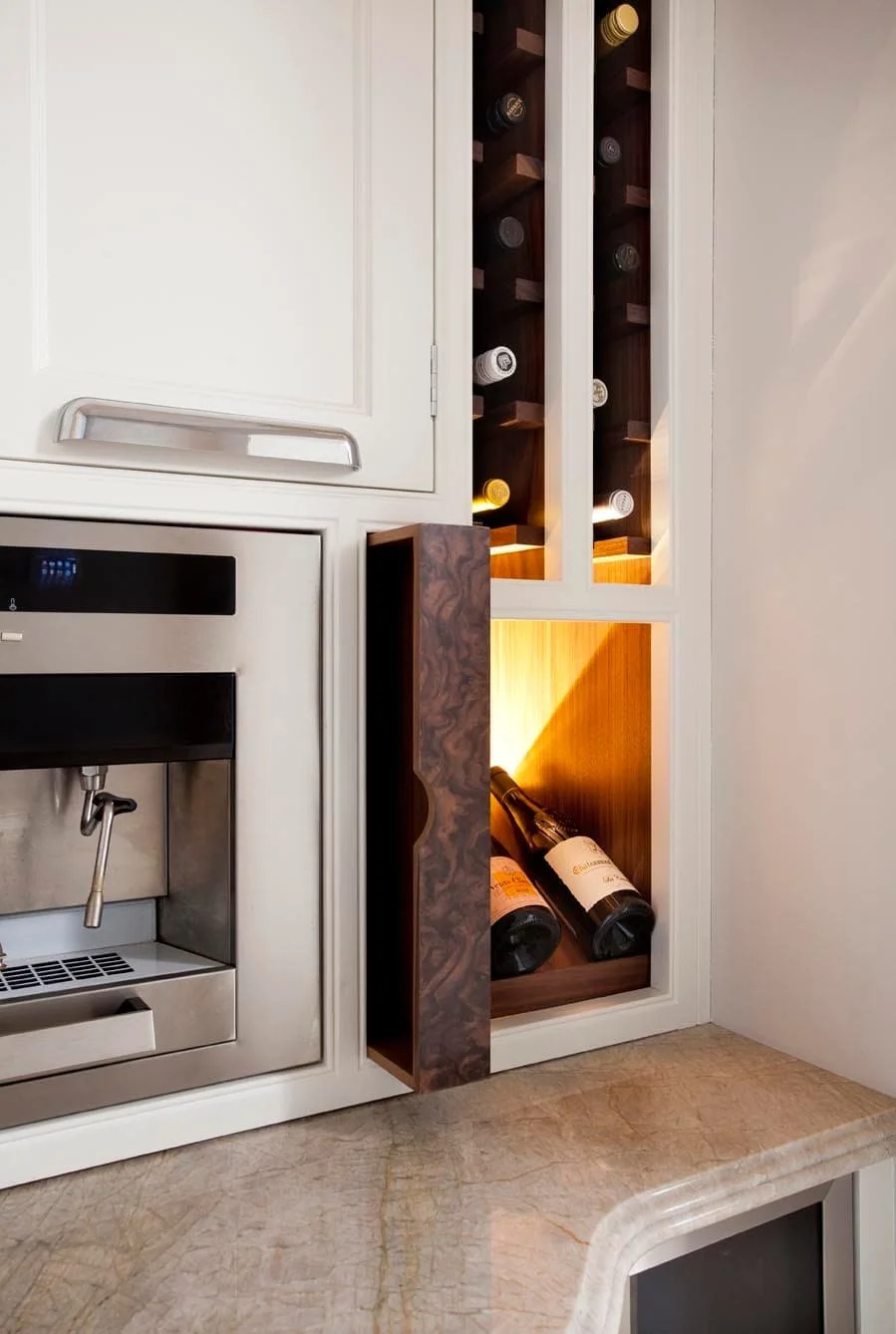 Bespoke kitchen interior with carefully planned furniture, materials and architectural detailing by Darren Morgan Design.