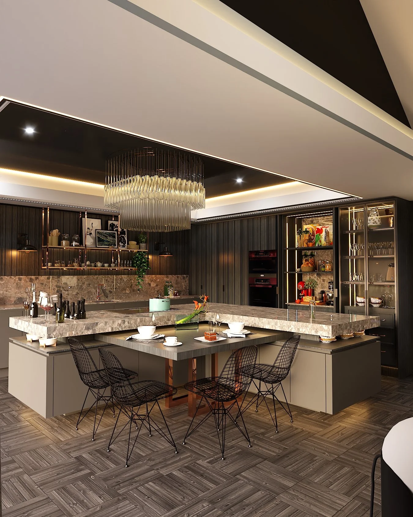 Contemporary kitchen and dining interior with dark cabinetry, marble worktop and chandelier.