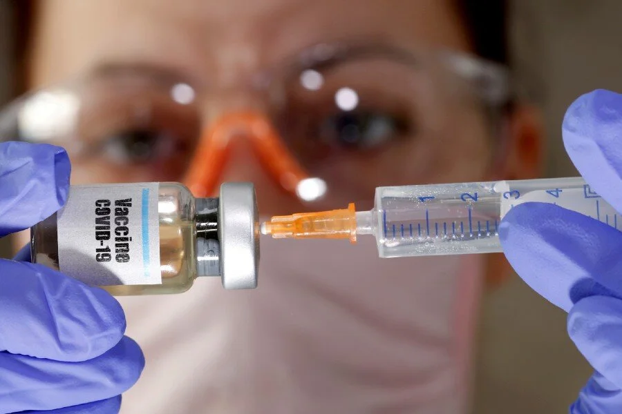 U.S. panel says health workers, first responders should be first to get COVID-19 vaccines