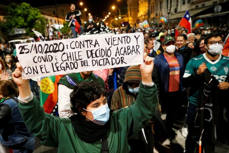 Chileans vote by millions to tear up Pinochet's constitution