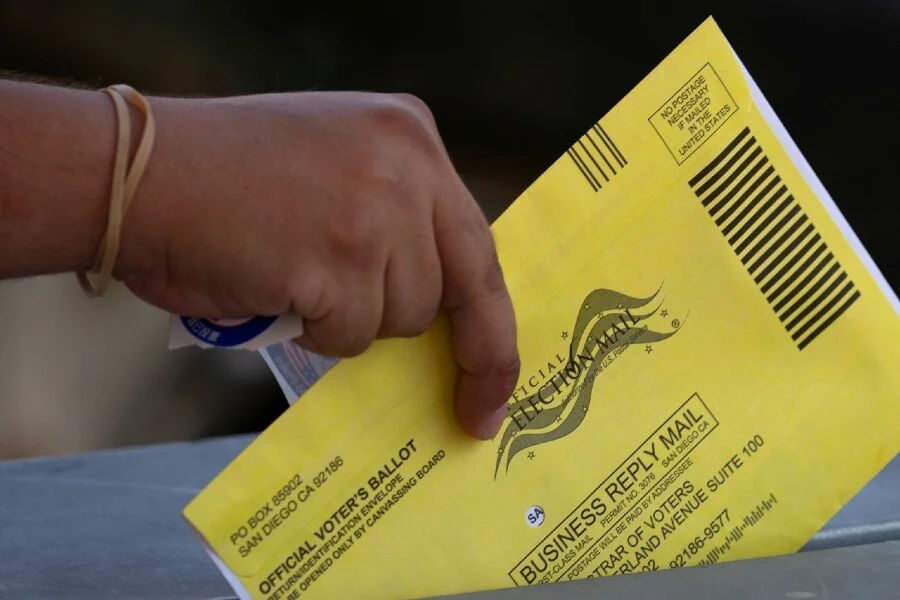 U.S. judge weighs bid to void 127,000 votes cast at drive-through sites in Texas