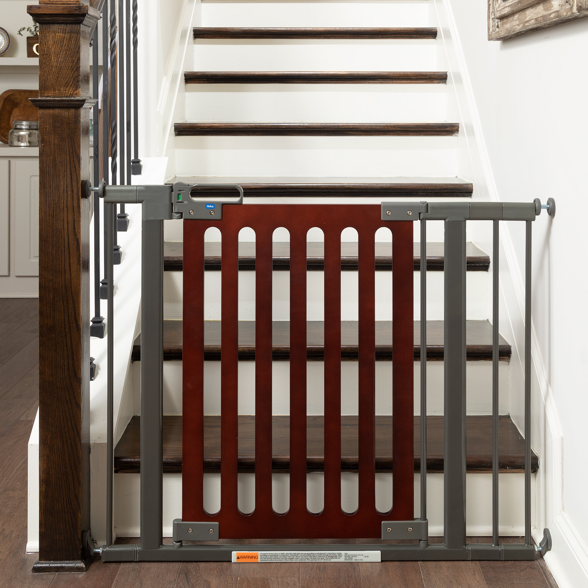Designer Baby Gate Extensions on a Spectrum Gate at the bottom of the stairs