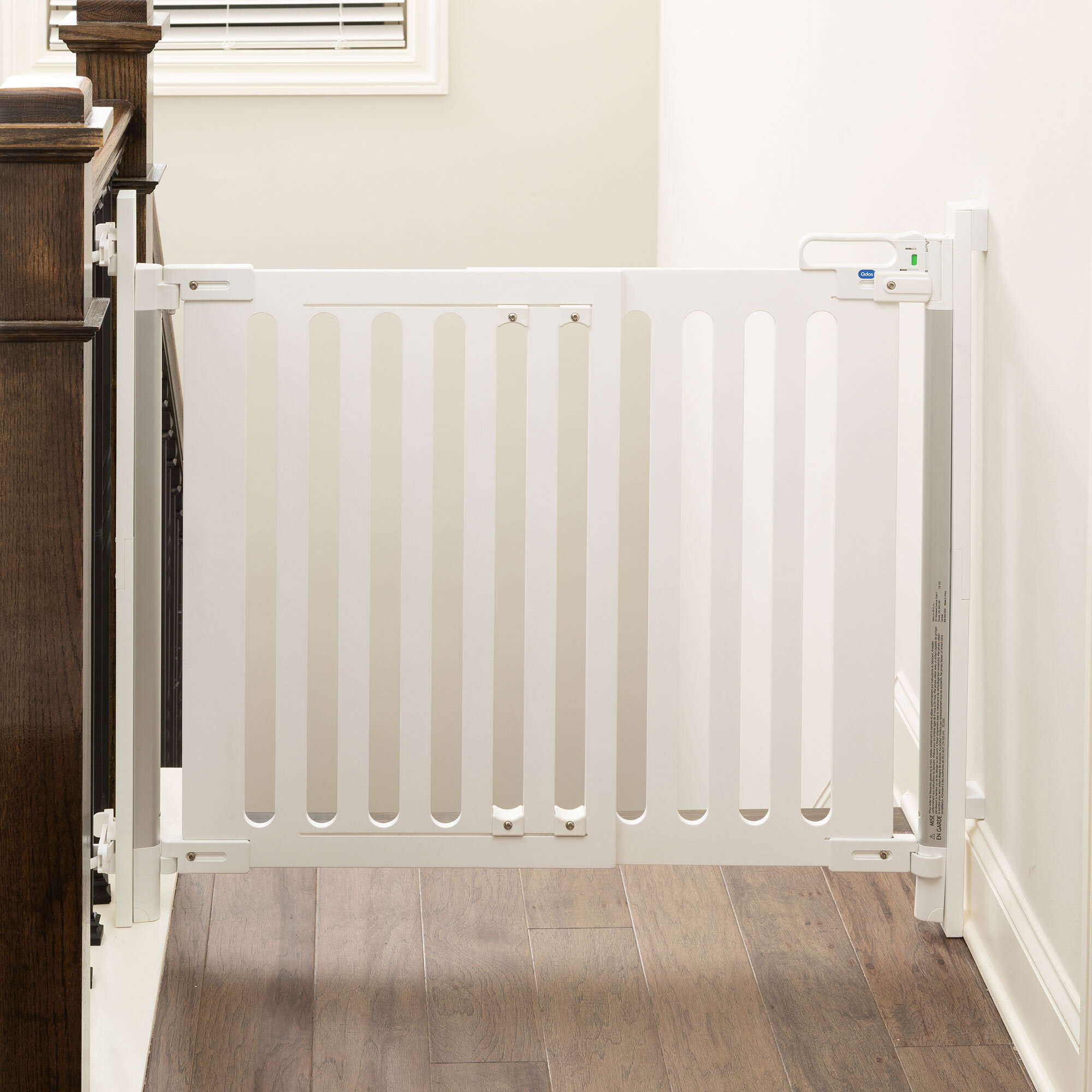 Spectrum Designer Baby Gate at top of stairs