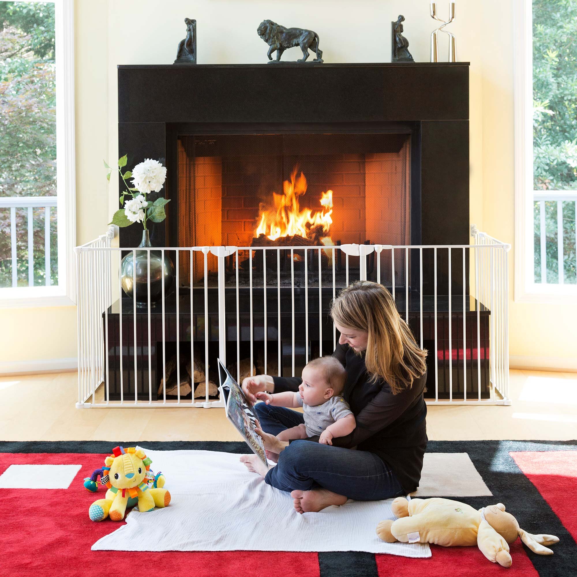Construct-a-Safegate protecting mother and child from fireplace