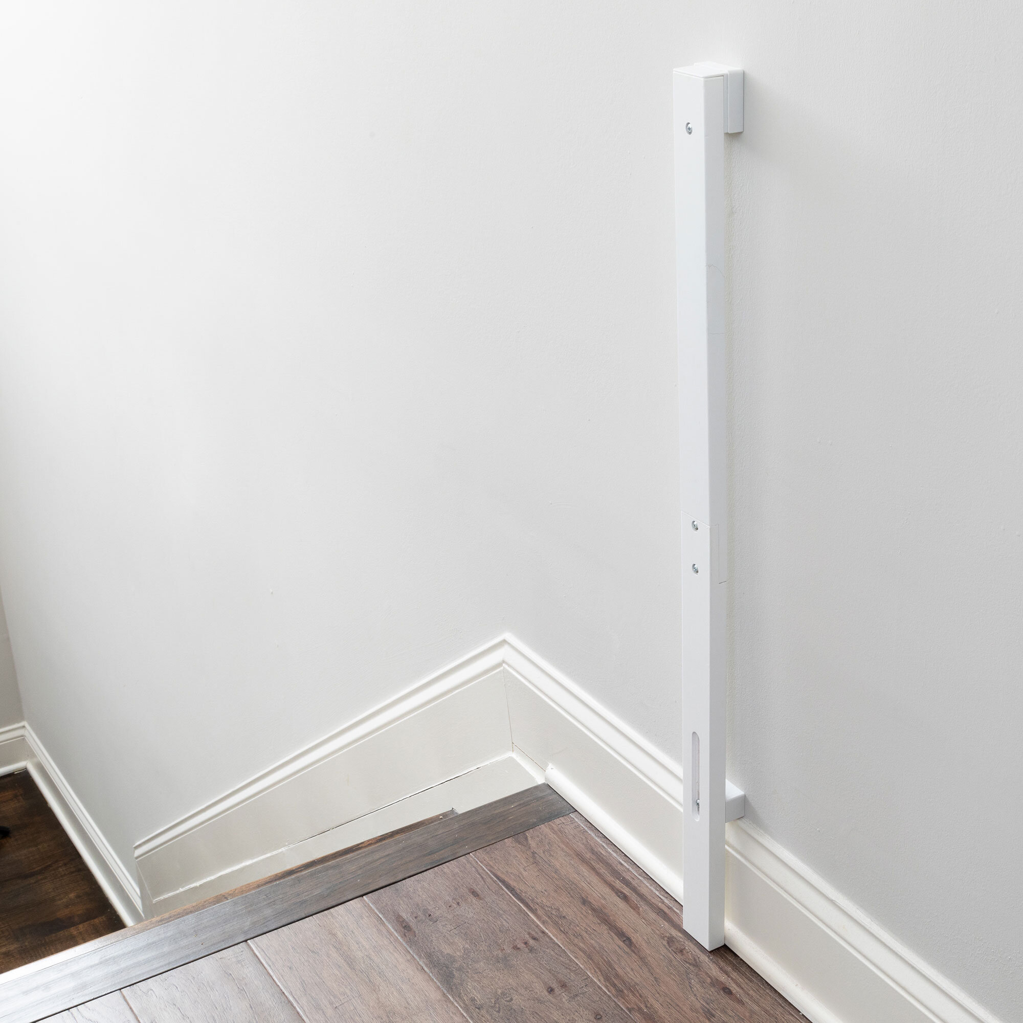 Universal Baseboard Kit Installed at top of stairs