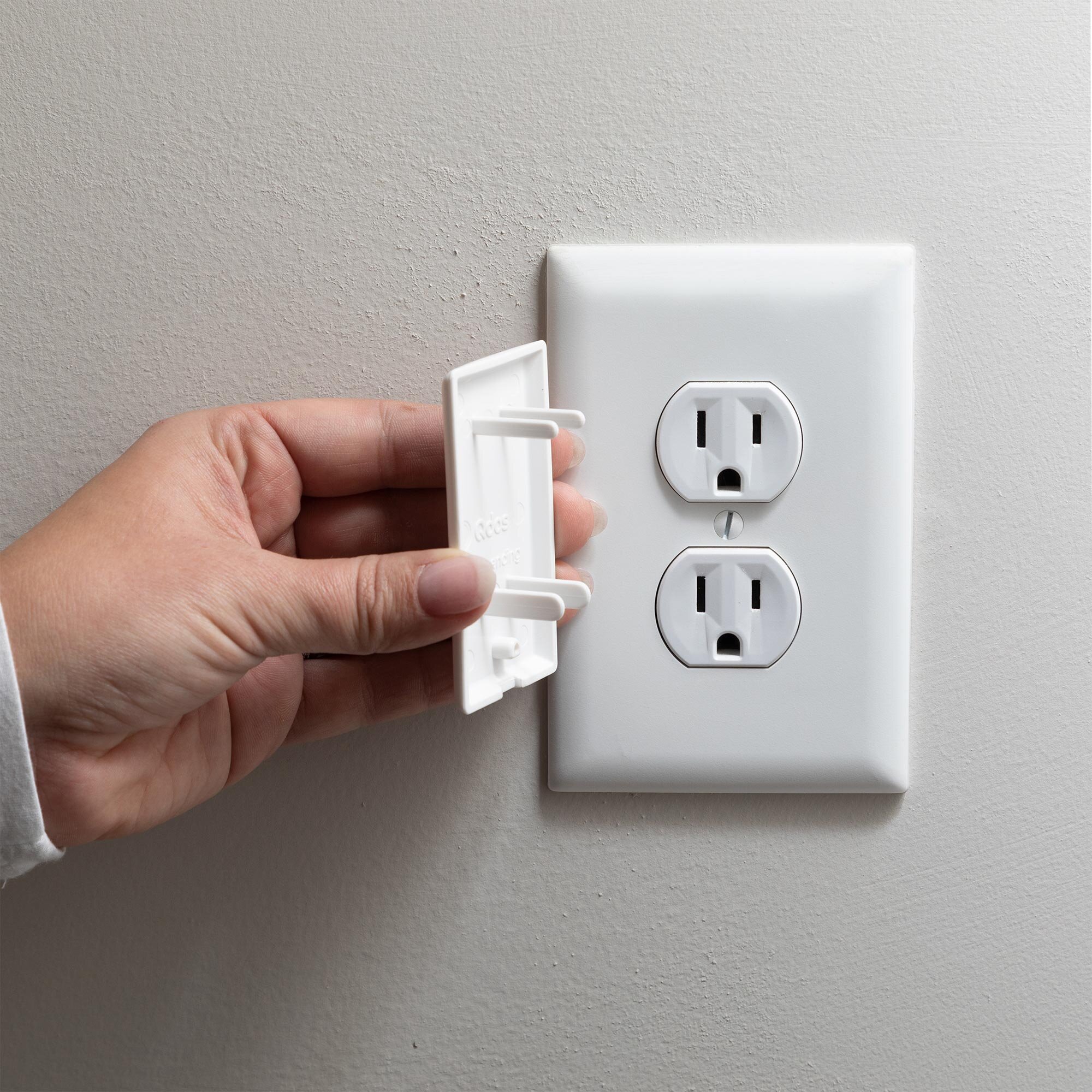 Installing StayPut® Double Outlet Plug