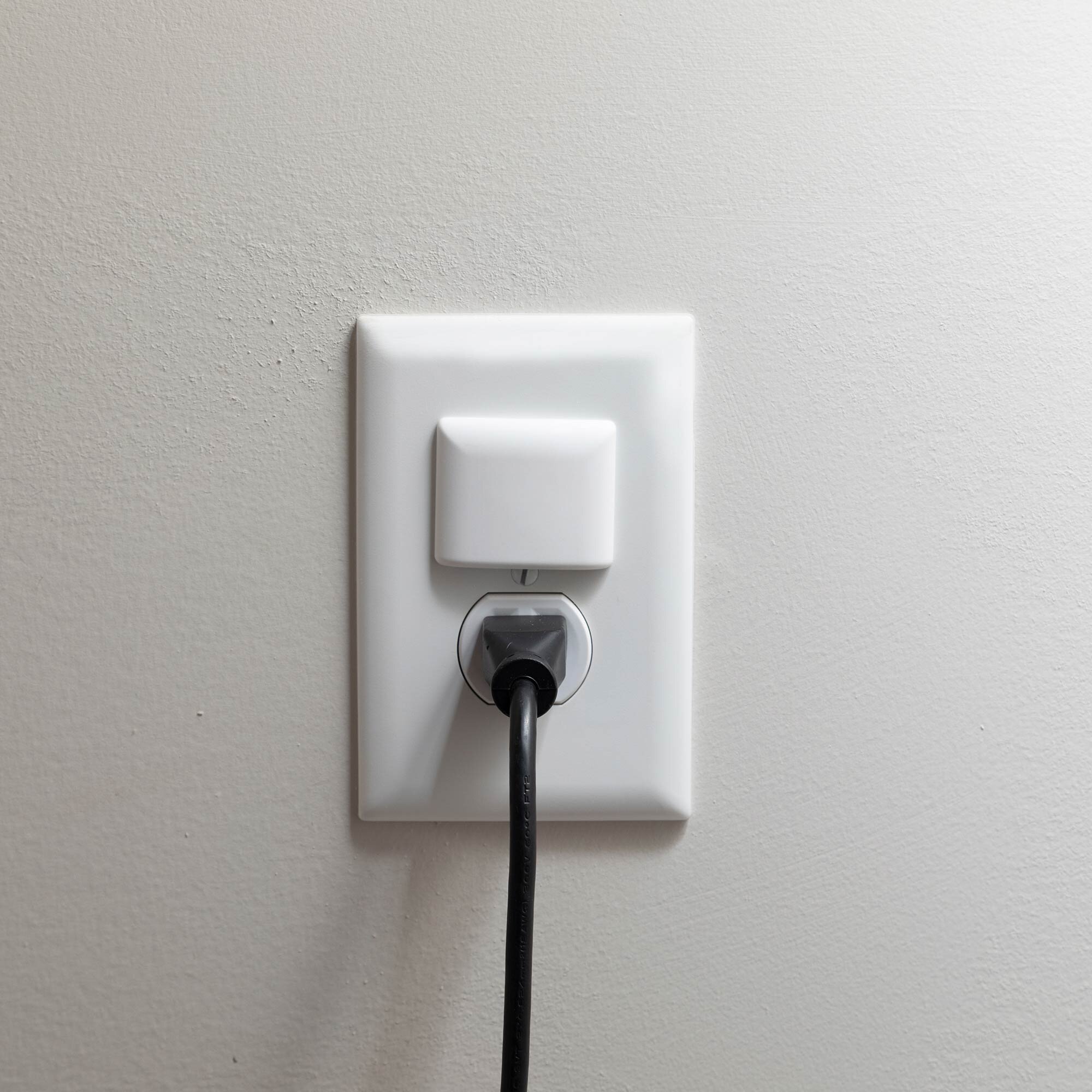 StayPut® Single Outlet Plug on one outlet