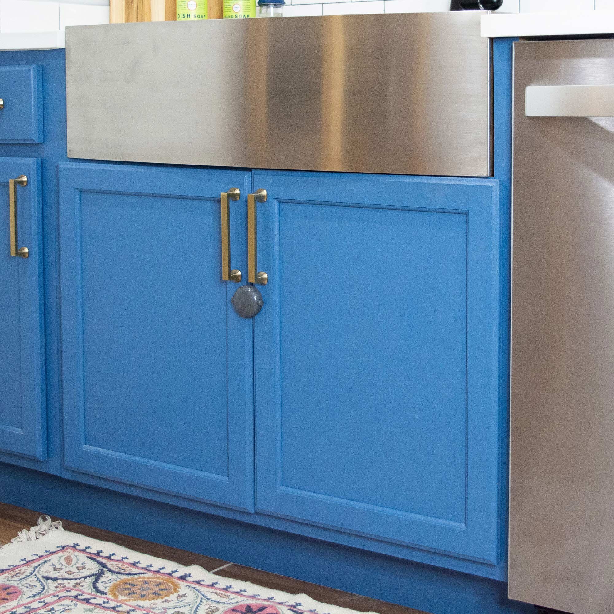 Adhesive Double Door Lock on blue cabinet