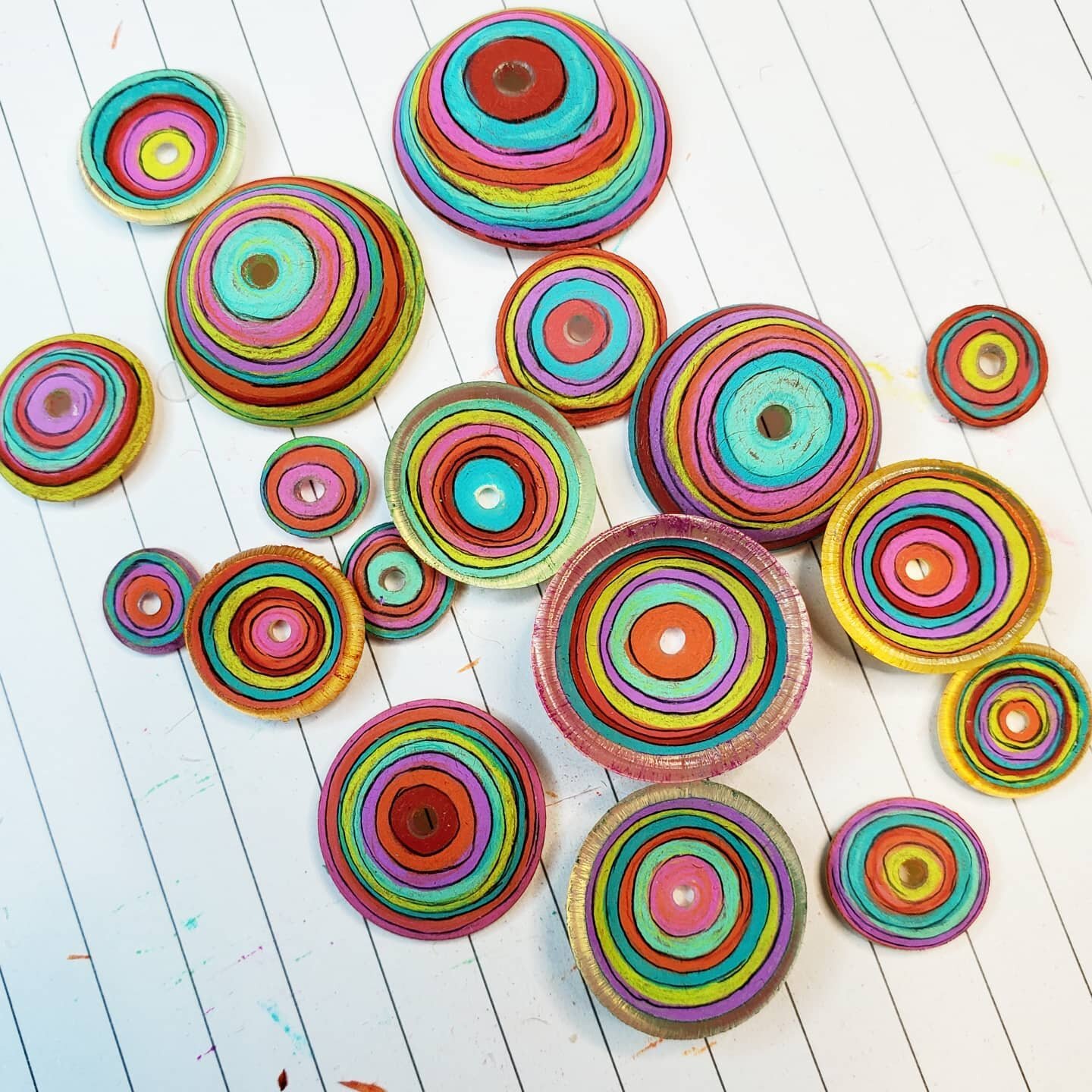 Prepping more #Shrinkets class samples for Tucson this fall with @juliehaymaker. #circles &amp; #stripes 4 ever!

#colorfulart #craftclasses #jewelrycrafts #makejewelry