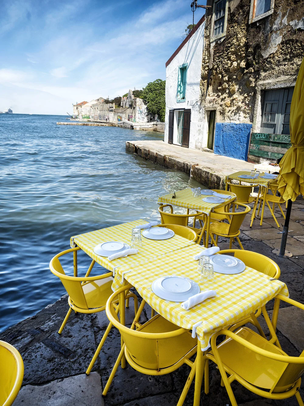 The table we sat at before the wave from the Cruise ship took these tables out and soaked my cousin Lena... I was quicker and moved out of the way of the splash and only got my feet soaked.